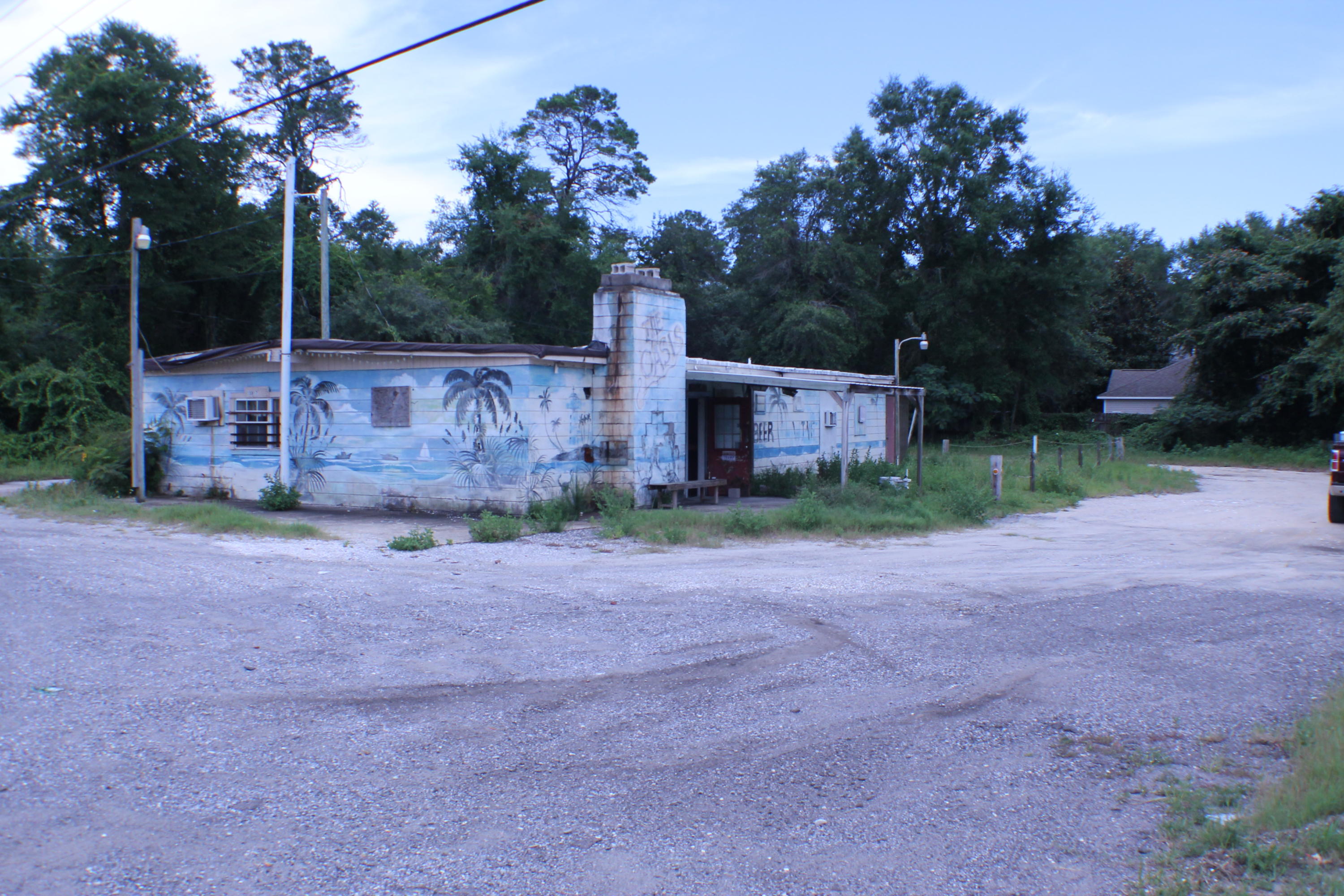 Little to no value in the building. Lot could make a great lay down yard, Trucking home base site as its between Destin, Freeport and Niceville.