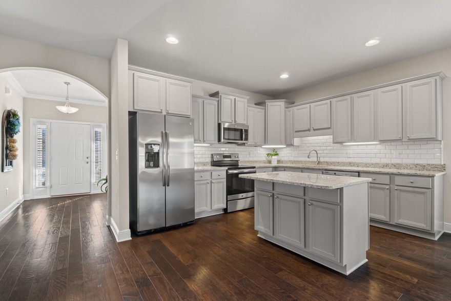 Welcome to the highly sought after neighborhood of Driftwood Estates! Upon entering a beautiful grove of oaks, you will soon experience the essence of community. This well-maintained brick home, including 3 bedrooms + bonus room, sits on a well manicured lot with a wooden privacy fence and a covered patio. With over 2,000 sq feet of single-level living, an on-trend open floor plan with an abundance of natural light, this home is a must see! You will enjoy the spacious kitchen area with ample storage featuring a large island for entertaining. Additional note-worthy features include, two car garage, minimal HOA dues, access to a large neighborhood pool amenity and a nearby local park, including tennis and basketball courts and pavilions with grill stations.