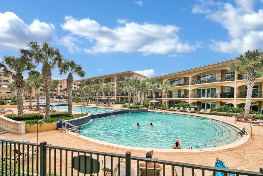 This spacious condominium is located in the luxurious gated Adagio development; an energetic gulf front community in Blue Mountain Beach.  The first floor unit is idyllic and offers multi-generational living with three bedrooms, two built-in bunks, and three full bathrooms. Raised ceilings, crown molding, granite counters, stainless steel appliances, and tile flooring embellishes this pool front unit.  Whether you are relaxing or entertaining, the position of this unit make it a breeze with the beautiful open kitchen with bar stools, dining area, and spacious living area. The covered  ground floor patio is complete with a chaise lounge and an outdoor table and chairs for al fresco dining. Ideal for outdoor overflow with views of the resort style pools. "Ocean Lullaby" is the epitome of the luxury condo experience and delivers the ultimate beach lifestyle as a second home or rental property. Currently on Friends at the Beach rental program with all furnishings and bookings to convey with current total gross at $78,000.
The Adagio complex is a lesson in luxury resort living. Overlooking Blue Mountain Beach, it has an 8,000-sq.-ft. pool on three levels with waterfall features, hot tub and fitness center plus a fountain and 15-ft. diameter hot tub. The deeded white sandy beach is steps away for strolling, shelling, and swimming in the Gulf of Mexico. Grayton Beach and Seaside, Florida, are just a bike ride away. Room dimensions to be verified.