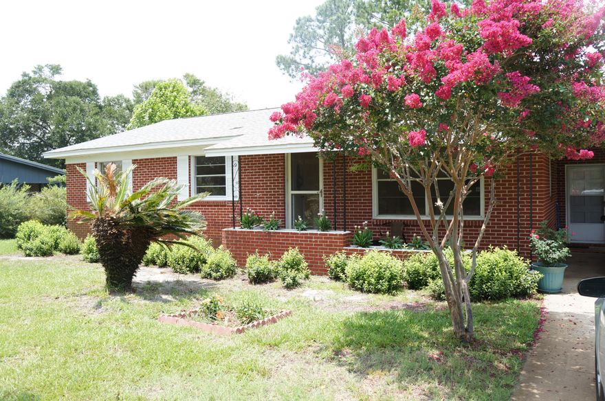MUST SEE!!! New finish on original hard wood floor! Fresh paint throughout the home! New carpet in den and dinning room. BEAUTIFUL SINGLE STORY BRICK HOME ON .47 ACRE LOT CONVENIENTLY LOCATED IN THE Heart OF FORT WALTON BEACH! This home is a spacious 1,656 SQ. FT. with 3 bedrooms, 2 baths, separate den, family room, dinning room and attached carport. Conveniently located in the heart of Fort Walton Beach, walking distance to Schools, Shopping, and Dinning. Just a few minutes drive to Hurlburt and Eglin Air Force Bases and the Beach. Large workshop on the back of property. Great home for a family, first time buyer, military, or investor!