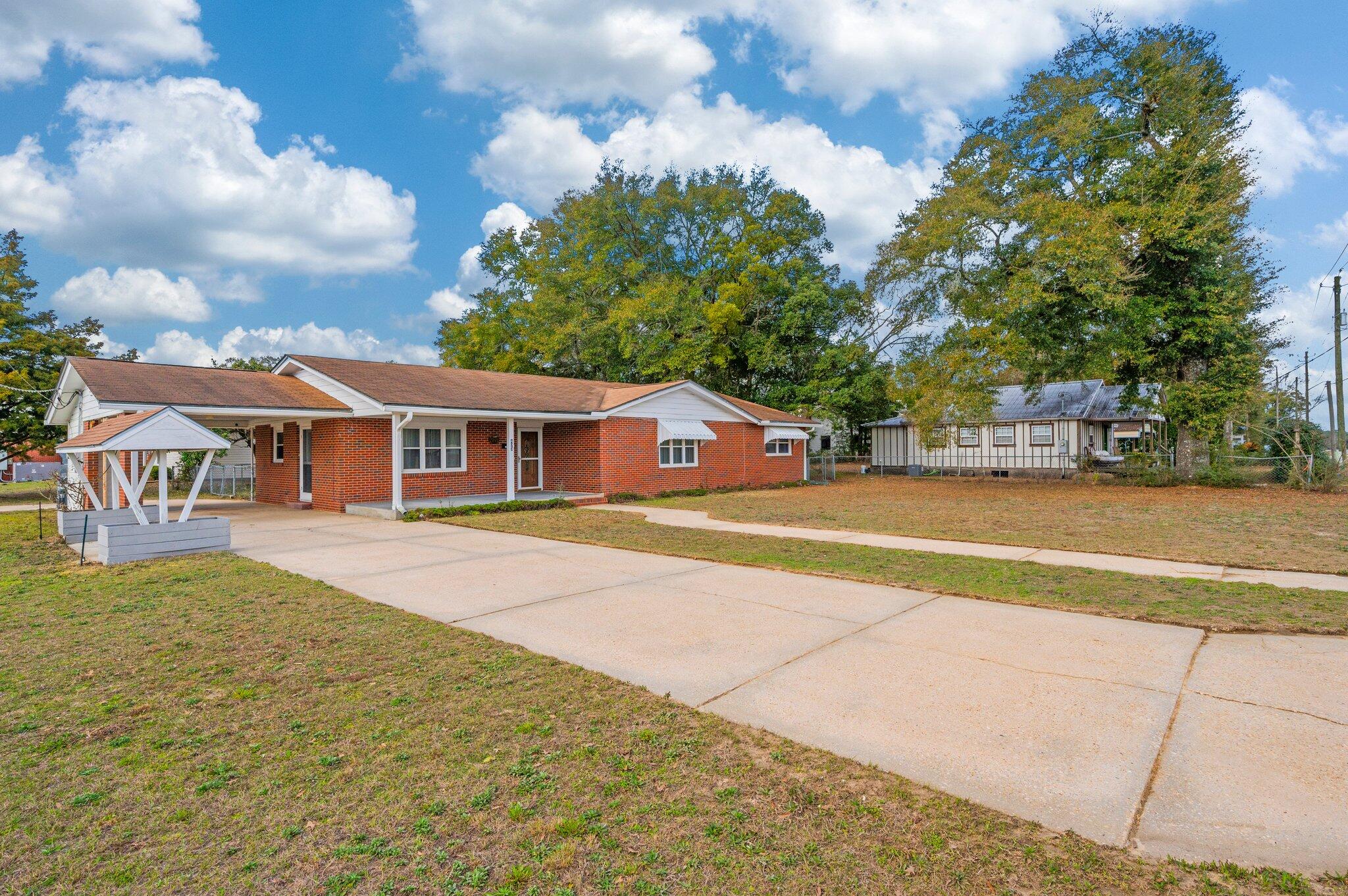 423 W Live Oak Ave, DeFuniak Springs, FL 32435 is brimming with untapped potential and ready for your vision. This spacious fixer-upper sits on a generous lot and features a classic front porch, an open layout, and the kind of bones that investors dream about. With original elements like cloth wiring still in place, it's the perfect opportunity to modernize and add value. Whether you're looking to flip, renovate and rent, or hold as a long-term asset, this property offers flexibility and upside. Located just minutes from downtown and Lake DeFuniak, it's a smart buy for anyone ready to transform potential into profit. Don't miss the chance to bring this beauty back to life--and build equity along the way.