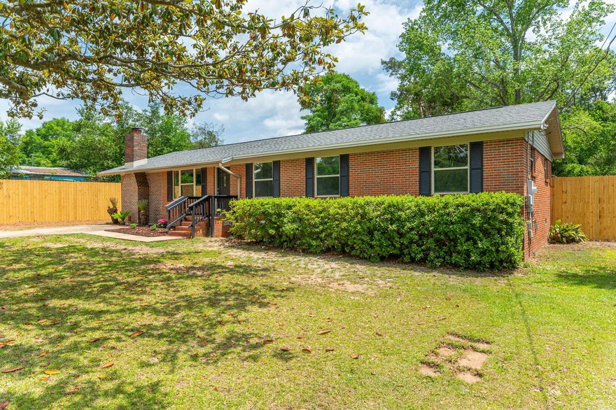 *** SELLER PAYS $5K TOWARD BUYER'S CLOSING COSTS!! *** Beautifully renovated 4 BD/2 BA home situated on a large nearly 1/2 acre lot, this ranch style home features a neutral color palette and Luxury Vinyl Plank flooring throughout. The home has both a living room and family room/den with wood-burning fireplace and brick surround. Eat-in kitchen boasts bright white cabinetry, quartz countertops and stainless steel appliances. NEW ROOF AND WATER HEATER!! The screened-in back porch overlooks the fenced-in backyard complete w/ large workshop and separate yard building. You don't want to miss this one!!!