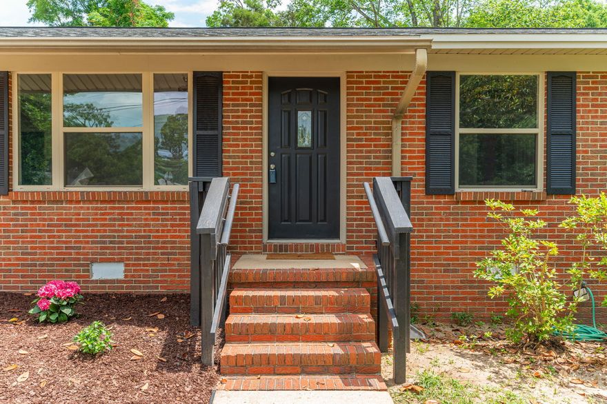 *** SELLER PAYS $5K TOWARD BUYER'S CLOSING COSTS!! *** Beautifully renovated 4 BD/2 BA home situated on a large nearly 1/2 acre lot, this ranch style home features a neutral color palette and Luxury Vinyl Plank flooring throughout. The home has both a living room and family room/den with wood-burning fireplace and brick surround. Eat-in kitchen boasts bright white cabinetry, quartz countertops and stainless steel appliances. NEW ROOF AND WATER HEATER!! The screened-in back porch overlooks the fenced-in backyard complete w/ large workshop and separate yard building. You don't want to miss this one!!!