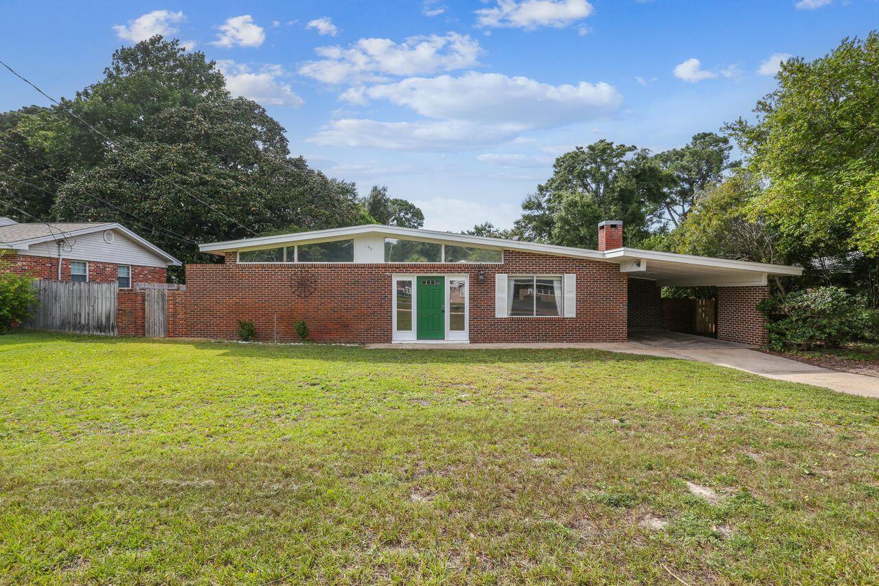 Your location is everything! Here it is close to beaches, parks, pickle ball, School, playgrounds, yacht clubs! This three bedroom one and a half bath brick home with carport! Large lot with mature trees! Romantic feature fireplace! Granite countertops, and updated kitchen! Solar panels to save electrical energy bills! Solar panels will be paid off at closing! Hurry book your appointment to View today!