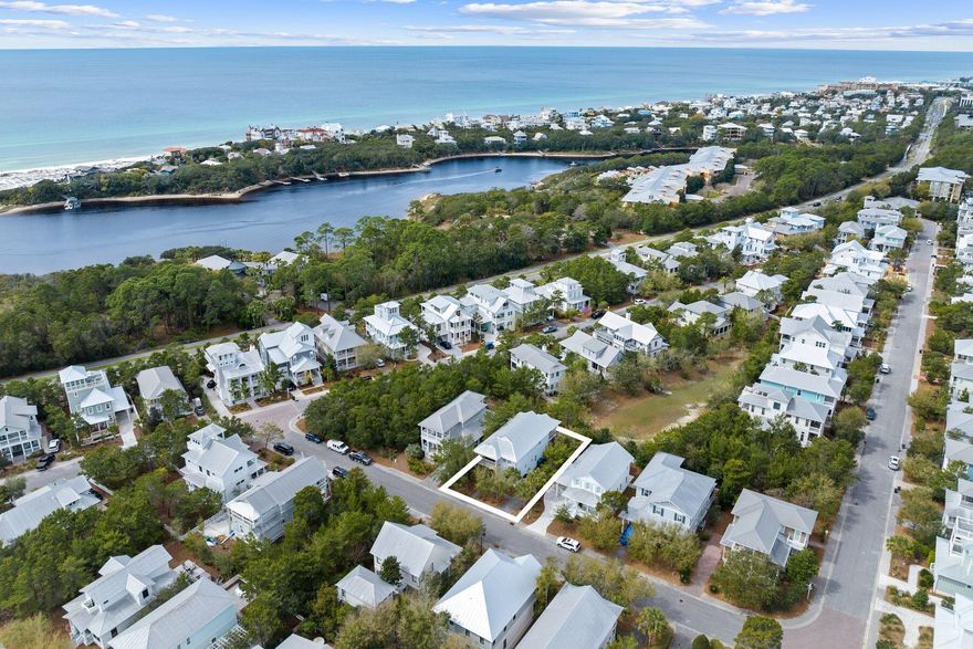 Nestled in the gated community of The Preserve at Grayton Beach, perfectly situated along Scenic Highway 30A between Grayton Beach and Blue Mountain Beach, this beach cottage offers freshly painted kitchen and bathroom cabinets, hardwood flooring and custom wood shutters throughout, open living spaces, four bedrooms, each with an en suite bathroom, and 2,897 square feet of living space. A well-designed and generously-sized floor plan, numerous porches and a private location bordering the community green space position this property as an enviable beach retreat. Mature landscaping and paver parking lead to the welcoming front porch. The first floor of this cottage offers an open living, kitchen and dining area with hardwood floors and ample natural light. The well-appointed kitchen offers marble countertops, stainless steel appliances and a large center island. The kitchen seamlessly flows into the open dining and living room. A screened-in back porch offers a peaceful place to enjoy morning coffee with an additional paver patio for grilling and entertaining guests while overlooking the community green space. The first level also offers one of two owner suites equipped with a king-sized bed, en suite bathroom with a double vanity and walk-in shower. A first-floor powder bathroom adds comfort and convenience for guests. The second-level offers an additional owner suite with a private balcony, large en suite bathroom and walk-in closet. The second level also provides two additional bedrooms including a six-person bunkroom and a guest room with a private balcony and walk-in closet. Ideal as a second home, rental investment or primary home, owners and guests within The Preserve at Grayton Beach enjoy an amenity-filled beach lifestyle that includes a private beach access, two community swimming pools, lighted tennis courts with pickle ball lines and a fitness center. Nearby coastal dune lakes, Big Redfish Lake and Western Lake, are infamous for kayaking, paddle boarding and fishing. This prime location also allows for easy access to the biking trail along Scenic Highway 30A along with the beloved dining, shopping and entertainment in Blue Mountain Beach, Grayton Beach and nearby Watercolor and Seaside.