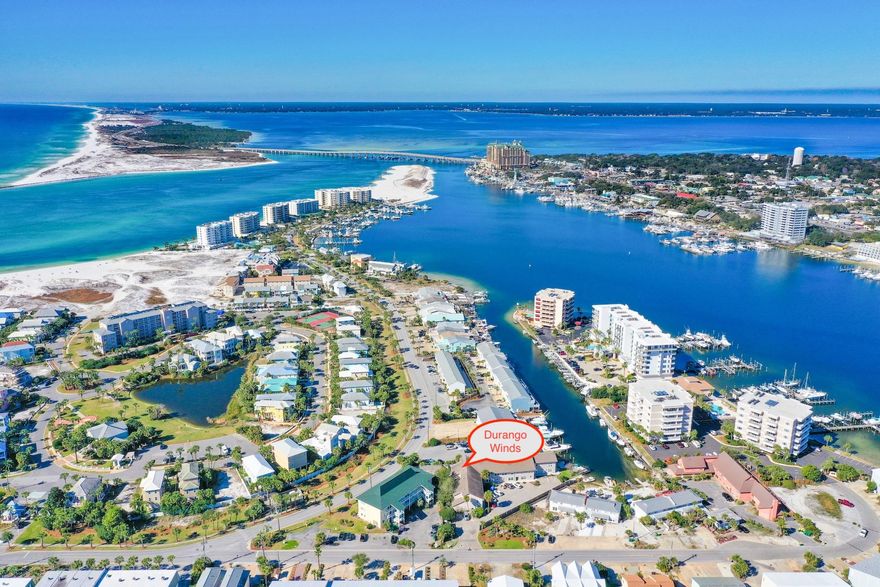 Durango Winds is a canal front complex perfectly located on Holiday Isle, and just a short walk or bike ride to the beach! This 3 bedroom, fully furnished unit offers luxury vinyl plank flooring downstairs, stainless steel appliances, and a fenced-in private back porch as well. Durango Winds offers a community dock on the canal, and a temporary boat parking for HOA members. You can call the water taxi to pick you up and drop you anywhere on the Destin harbor! The Holiday Isle beach access is nearby, as is Norriego Point. All of the fantastic restaurants and fun that Destin is famous for is so close by. Come take a look at this fantastic opportunity to own on Holiday Isle! Buyer to please verify all information contained herein.