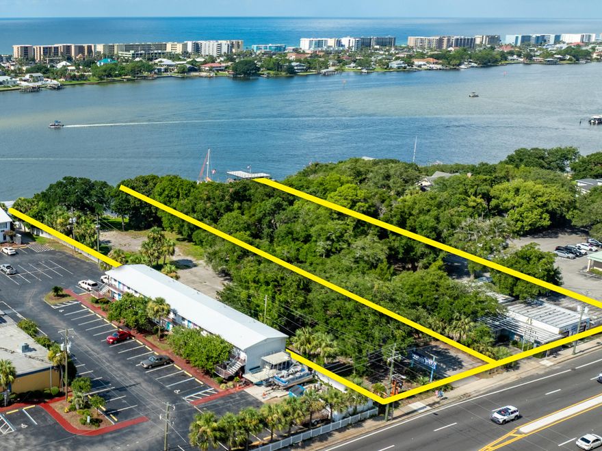 Extraordinarily rare legacy waterfront assemblage favorably zoned ''MX-2 Mixed-Use'' (pursuant to City of Fort Walton Beach land development code) for high density redevelopment to achieve economies of scale involving a plausible host of viable development scenarios. Its prime +/-248 fronting footage on the scenic Sound of Ft. Walton Beach, Florida, as well as +/-248' along Miracle Strip Parkway, is within +/-1/2 mile from the spectacular Brooks Bridge (under development and construction), as well as a pedestrian friendly, short walk to the historic downtown district of Fort Walton Beach, Florida. The combined total waterfront acreage is +/-2.47, while the dimension of the two contiguous, combined parcels is as follows: 248' x 230' x 248' x 218'.  The assemblage is offered as-is, where-is, with no attributable value to the current structures onsite.  Buyer must verify zoning, potential development entitlements, riparian rights (dock / "marina") through the City of Ft. Walton Beach, Okaloosa County, and including but not limited to the Corp. of Engineers, and the FDEP.  Access to the property is strictly prohibited unless properly scheduled with advance notice through the listing agent(s).  Please inquire for additional information.  "MX-2 Mixed High Use" was defined as follows:  MX-2  Mixed-use (High Intensity) Zoning District. The mixed-use zoning district is established to provide for a wide variety of land uses, including multifamily structures, commercial and office uses, artisan studios, and cottage industries. Accessory uses for residential developments include onsite amenities, such as recreation facilities, carports, garages, storage buildings, parking lots, transit stops, and community buildings. Accessory uses for nonresidential developments include such onsite amenities as parking lots, parking structures, storage buildings, or transit stops. Open space in the form of plazas and courtyards may be provided. Waterfront locations may include accessory uses such as docks, boardwalks, or facilities for direct water access to support water-dependent uses. Uses within the MX-2 zoning district may be mixed within one (1) parcel or lot and may be mixed within one (1) building. The maximum density is thirty (30.0) dwelling units per acre. Bonus provisions may be authorized to allow a maximum density up to forty-five (45.0) dwelling units per acre. The maximum floor area ratio for nonresidential development is two (2.0) FAR. Bonus provisions may be authorized to allow a maximum floor area ratio of three (3.0) FAR.