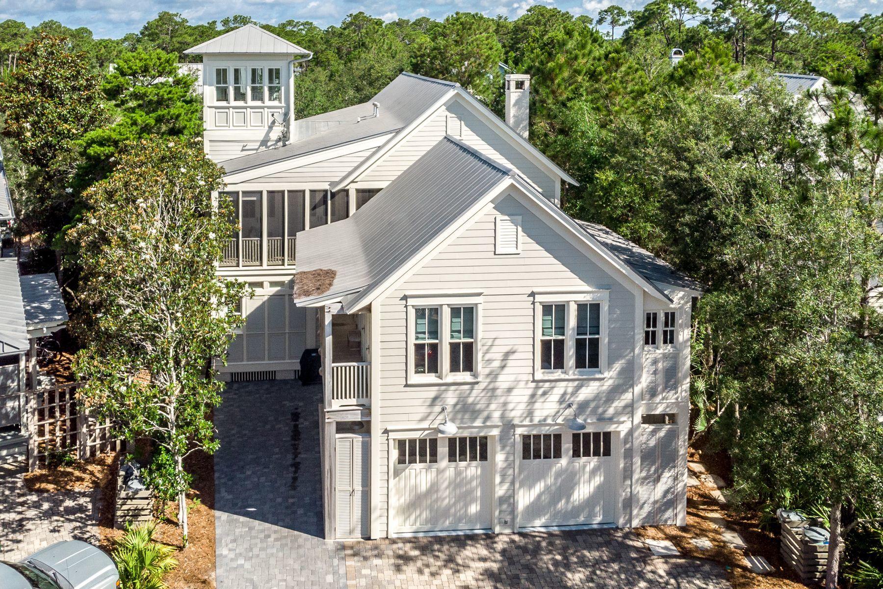 This 5 bedroom, 5 -1/2 bath home is located in Phase 1 of Watercolor. The home has been recently painted both inside and out making it light and bright! The home offers an abundance of porches, with two covered and three screened-in porches, beautiful hard wood floors, shiplap walls, plantation shutters and beamed ceilings throughout. The brick fireplace is surrounded with built in wood cabinets and offers an inviting place to gather after a long day on the sugar white sands of the Gulf of Mexico. The living room opens to both the kitchen and dining area offering a great space to gather with family or entertain guests. The kitchen is complete with a subzero stainless steel refrigerator, oversize Thermador professional gas range, hood, oven, warming drawer and microwave, kitchen-aid ice maker