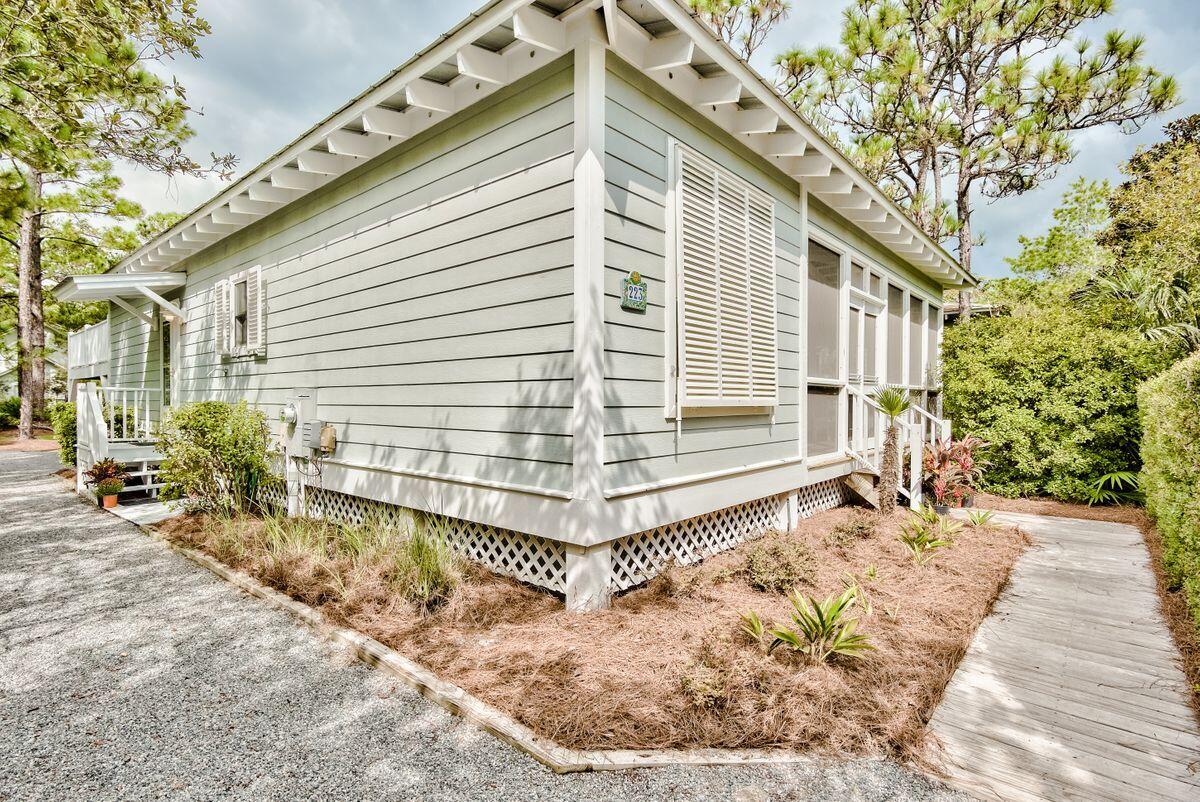 Backup offers being accepted; under contract with a kick-out clause. This quaint Grove by the Sea beach cottage is located in the front of the neighborhood just a few steps to the pool and a short walk across 30A to the pristine beaches of Seagrove. This original owner home has never been a rental and is in immaculate condition. It is offered fully furnished and rental ready including a golf cart! The possibilities are endless a' expand the footprint and add additional bedrooms, enjoy as a second home or turn this beach retreat into a rental. This one level open concept home with hardwood floors and cathedral ceilings in the main living area features a relaxing screened in porch as well as an open deck over the garage for star gazing. The lush, wooded backyard offers ultimate privacy....