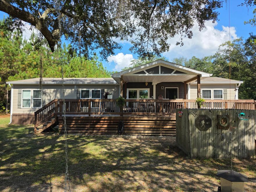YOU CAN HAVE IT ALL!! Acreage, Privacy, Horses and MORE! 35 Minutes to the beautiful beaches via HWY 79.  Beautiful 3 bedroom, 2 Bath home is meticulously kept. LVP, Vinyl, stainless appliances.  Move in ready.  Large  covered porch out front, out back that leads to a 29' pool. /a beautiful pool deck 16x28  and covered gazebo  12x16 for entertaining.  An oasis in itself. Pole Barn to park your cars and equipment 32x48. Detached SHE SHED 12x16 with 2 lofts for storage. Well is 142' deep.  If you are looking for quiet living this is for you. MOVE IN READY!!