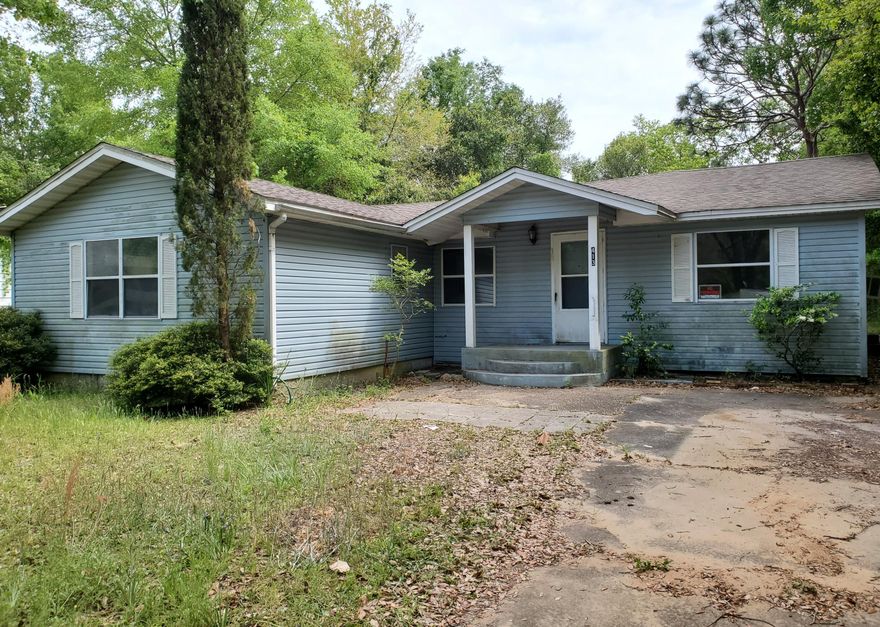CALLING ALL INVESTORS! Cute fixer-upper with TONS of potential! This 4 bedroom 1.5 bath home sits on a huge lot and features spacious rooms throughout. This property is distressed and in need of updates and TLC, but the renovation possibilities are endless. Vacant and easy to show!