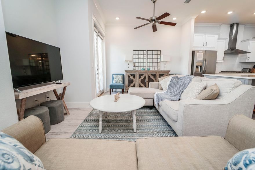 Extremely rare opportunity to own a one-of-a-kind, custom designed (3) bedroom townhome in the highly desirable community of Prominence north. This (A) UNIT is conveniently located next to the community pool on a premium lot that backs up to a large green space. Offered fully furnished with golf cart, this turn-key unit features plush and high-end furnishings and decor in natural and coastal blue hues. From the light ceramic tile floors and premium tile throughout, professional lighting, granite countertops, custom cabinetry to the subway tile backsplash, this amazing townhome is a great find and won't last long. The kitchen is a chef's dream with custom cabinetry, quartz countertops, stainless-steel appliances, gas cooktop, and a large custom granite island that is great for entertaining family and friends. Upgrades throughout include: custom hardwood floors, professional window treatments/drapes, custom woodwork, professional designed lighting, relaxing patio deck for all the amazing sunrises and sunsets, upgraded kitchen appliances, upgraded plumbing fixtures, tankless water heater, and a washer/dryer. 

Prominence is a retreat from the modern world and an essential community along scenic 30A. With a blend of coastal resort living, easy access to a vibrant town center 'The Hub', and the beautiful beaches of the Emerald Coast.... It's also a way of life in a community that lives up to its name. 

The Town of Prominence is located on HWY 30A between Seagrove Beach and Alys Beach, next to WaterSound Beach. Residents will enjoy low HOA fees, easy access to a beautiful Town Center (The Hub), Resort style pools, Fitness Center and Private Shuttle Service to the beach access. ''The Hub'' includes restaurants, shops, and an amphitheater with a covered event pavilion, a cinema screen for movies, as well as a stage for concerts and events...There's a reason it's called "The Greatest Backyard Party of all Time"