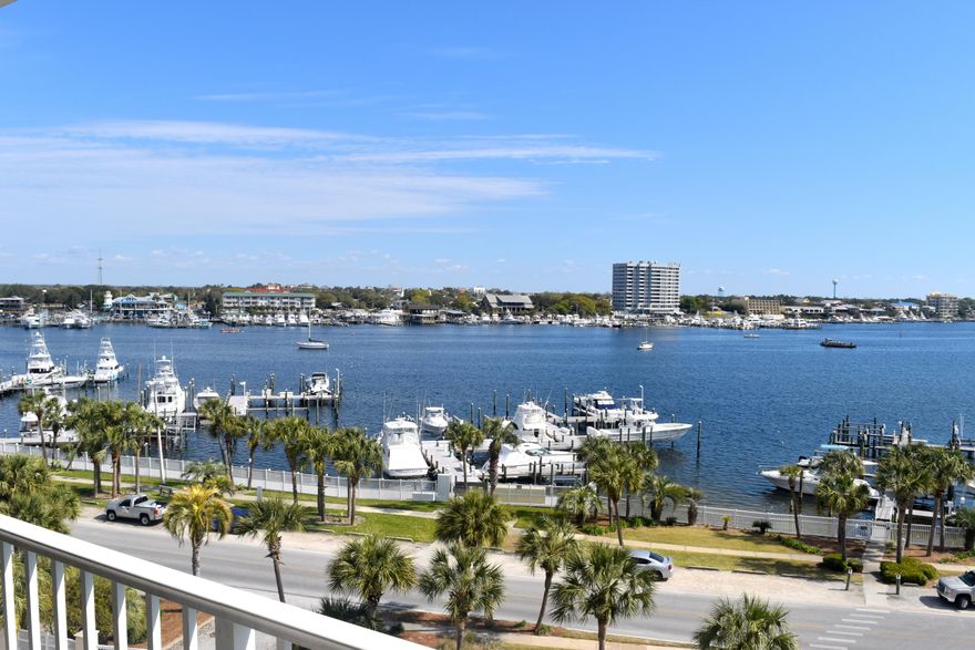 LIVE RELAXING ENTERTAINMENT from the balcony of your harbor-front condo. Watch the boats come & go from the harbor while relaxing on your balcony sipping your favorite beverage & enjoying the gentle breeze. Your own DEEP WATER BOAT SLIP & LIFT are included in the price. This top (6th floor) three bedroom, two bath unit says Welcome! Come in & stay awhile. Very comfortable, well-furnished & well-taken care of. The master bedroom & the second bedroom both have beautiful views of the harbor as well as the living area. Floors are tile in the living area & there is quality carpet in the bedrooms. Waterview Towers is a low-rise relatively small complex with many amenities to include: covered parking, a beachside pool, owner's room, fitness room, tennis courts, & a marina.