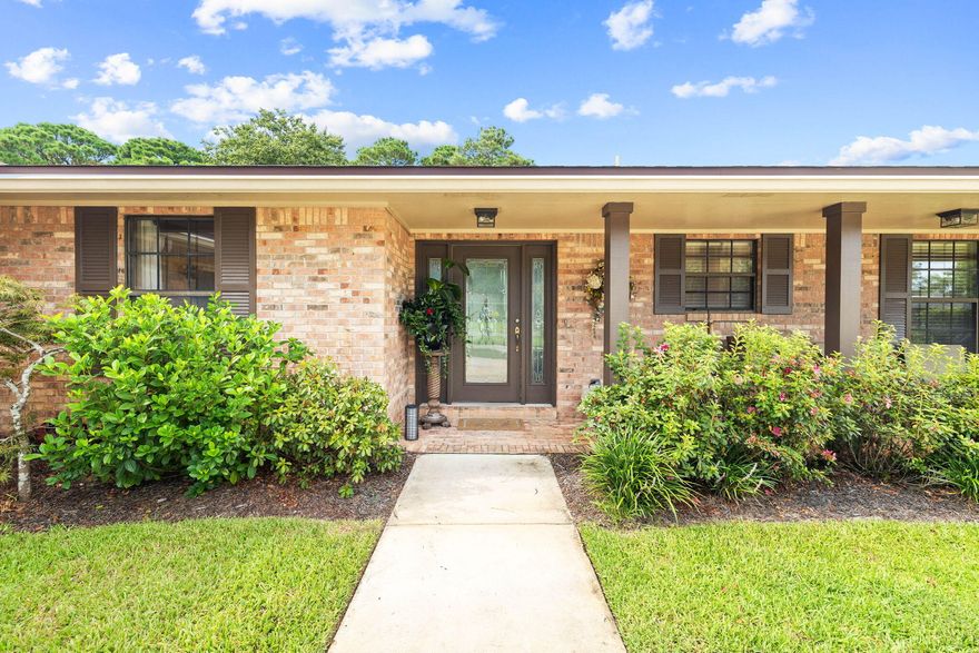 Seller is offering an interest rate buy down with an accepted offer! Set in an established neighborhood brimming with nostalgia, this beautiful single-level home sits on one of the largest lots in Indian Bayou. Beyond the gently bubbling heated pool, the serene outlook takes in extra acreage and mature trees creating a wooded backdrop to the manicured golf course. Step inside this meticulously maintained residence that includes four bedrooms, three baths and two beautiful living spaces. The inviting entrance sets the tone for elegance within. Graced by a warming brick-built fireplace, the family room is a light and open gathering area for entertaining or relaxing as a family. The open kitchen is the heart of this flexible living space with tile flooring, stainless appliances and a host
