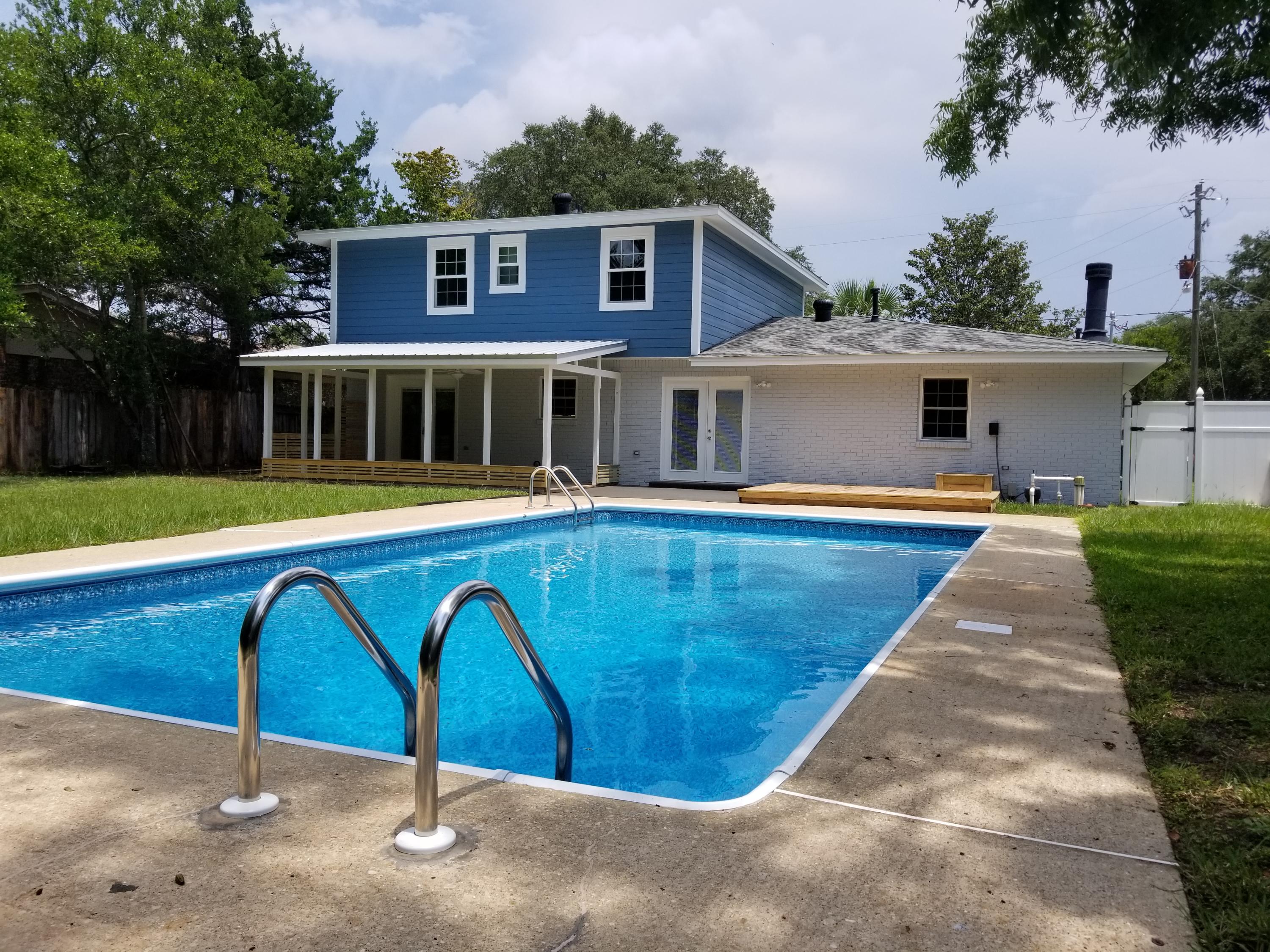 Completely renovated 4 bedroom 2.5 bath home with POOL! Prepare to be amazed! This home has it all! A New Roof, all new paint (interior & exterior), brand new windows, flooring, gorgeous kitchen w/ Farm sink, recessed lighting, plus all new stainless steel appliances including gas stove! Get ready to entertain in your own backyard pool oasis! French doors lead to the covered back patio complete with ceiling fan. Large concrete deck leads to the pool with new liner and all new pool equipment plus Privacy fenced backyard. All of this and so much more! Strategically located near Eglin AFB, Hurlburt Field, shopping, dining, and schools! Call Listing agents for more details