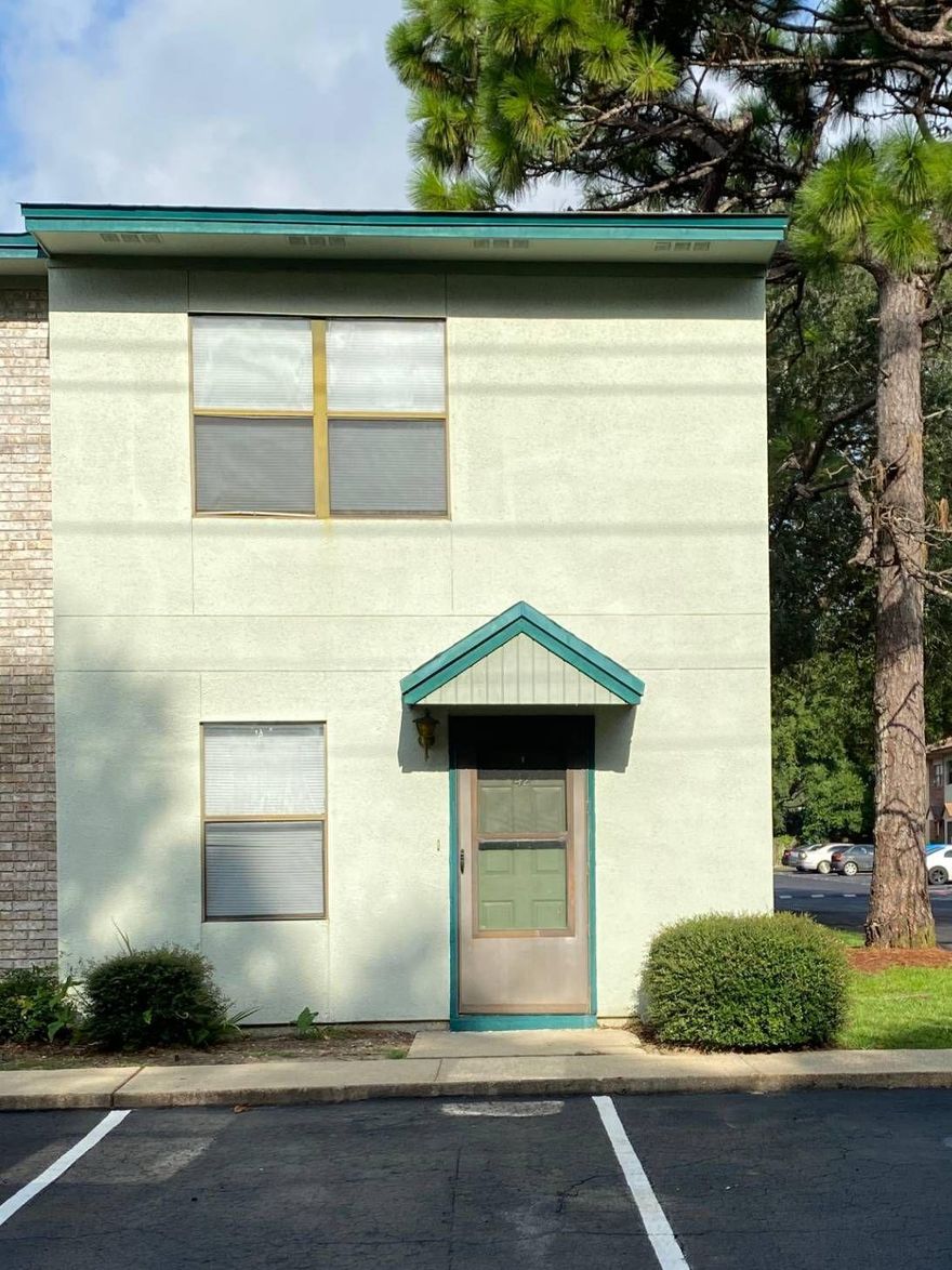 Unit offers a central location convenient to both bases. Located on the corner with a screened porch downstairs and a nice balcony upstairs. LVP downstairs with carpet upstairs. Two bedrooms up with full bath and a half bath downstairs. Two parking spaces in front of unit.There is a nice gazebo for your use. Free up your weekends with lawncare handled by the HOA.