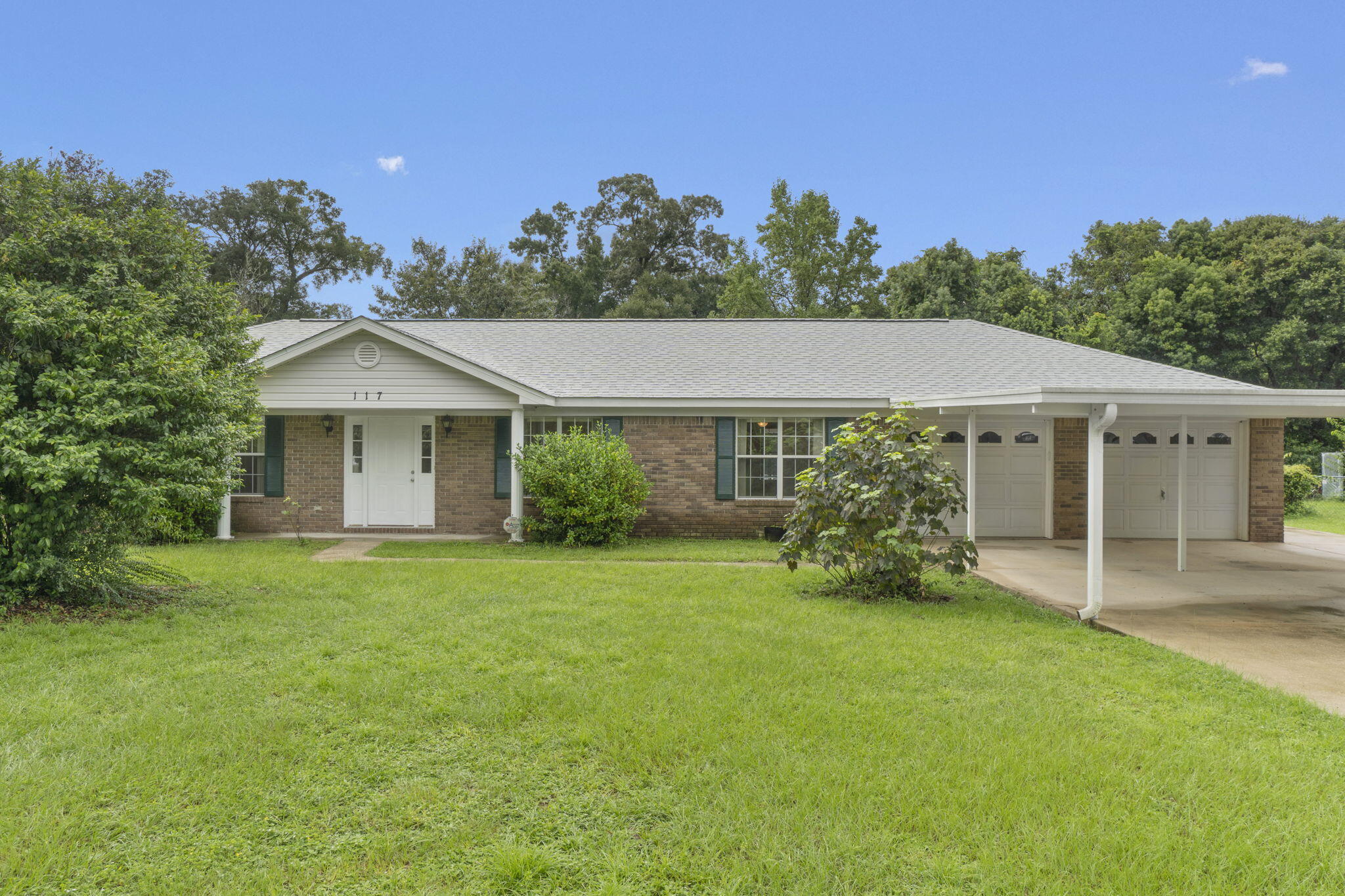 This adorable 3 bedroom, 2 bathroom home in the Oakfield Acres subdivision in Pensacola is move-in-ready and centrally located - just minutes away from schools, shopping, restaurants and quick and easy access to the interstates for commuting! This one owner brick home is situated on a generous sized lot and features a 2024 roof, a whole house - natural gas powered - Kohler generator, a 2 car carport leading to the 2 car garage and an extended concrete pad on the side of the house that goes to the gate to the backyard. Inside, you'll find fresh interior paint and tiled flooring throughout the home. Featuring a formal dining room, eat-in kitchen, living room with electric fireplace, and a versatile flex space at the front of the home that could be utilized as an additional living room/den, office, playroom - whatever fits your lifestyle! Just off the living room is a door to the screened in patio that looks out into the ultimate backyard space - complete with a weather-proof decking surrounded and fenced-in pool. The 3 bedrooms - the primary with its own ensuite - are all located on the left side of the home along with the spare full bathroom. Schedule your showing today and make this fantastic house your HOME today!