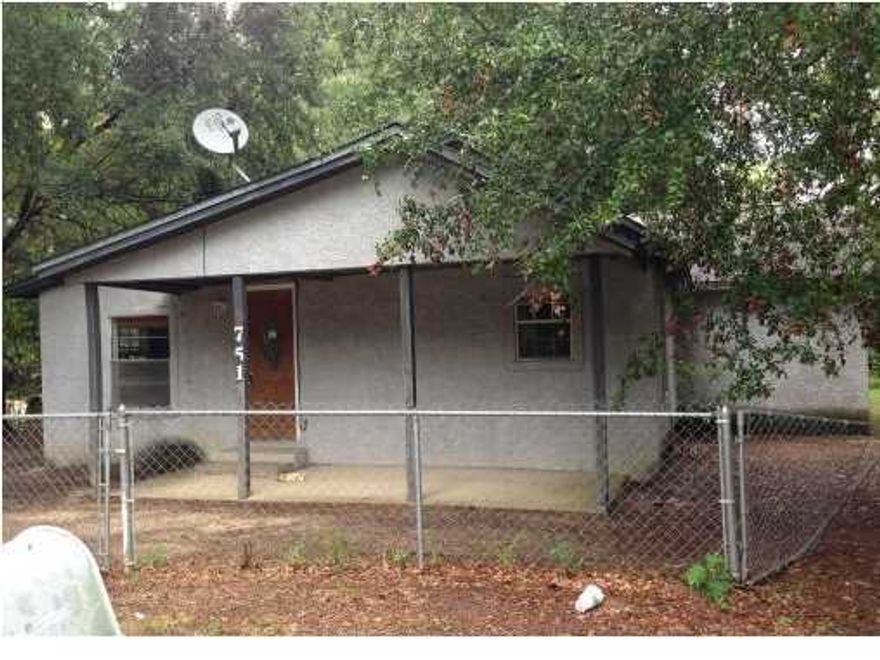 This home with some TLC has some nice features. Kitchen has been upgraded with newer cabinet and hardwood floors. Beautiful, mature trees and a fenced yard make this a deal at its current price. Buyer to verify for themselves any info deemed important.