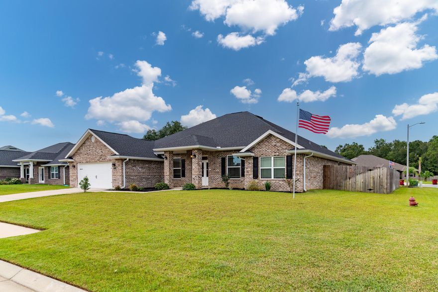 This five-bedroom home, built in 2021, (Transferrable Builder's Warranty in effect through 2031) blends modern design with practical elegance. Its open floor plan creates a seamless flow between the main living spaces, offering a sense of spaciousness and connectivity. Upon entering, you're greeted by a large, airy foyer leading to the heart of the home--a bright and expansive living room with ample windows, flooding the area with natural light. The living room flows into the kitchen, featuring an extra large pantry, a large island, quartz countertops, stainless steel appliances, and custom cabinetry. Adjacent to the kitchen is a dining area, perfect for entertaining. The five bedrooms are well-distributed, offering privacy and comfort.  The primary suite is a luxurious retreat, and an ensuite bathroom featuring dual vanities, a separate glass-enclosed shower, and a laundry room that offers direct access to the primary suite. Conveniently connecting to the walk-in closet, the primary bathroom, and the bedroom itself, the laundry room makes household chores more seamless. 9180 Tara offers two bedrooms at the front, sharing a spacious bathroom. In the rear of the home, two additional bedrooms share another well-appointed bathroom, offering a similar layout with easy access from both rooms. Perfect for guests or family members, this area provides privacy and convenience. This careful distribution of rooms, combined with the open floor plan and convenient laundry access from the primary suite, creates a perfect blend of communal living and personal retreat spaces throughout the home. The additional office provides a quiet space for remote work or study. Located on a corner lot, the home offers a larger yard with ample space for outdoor activities or gardening. The fenced in backyard can be accessed through from the living area, leading to a covered patio perfect for outdoor 
