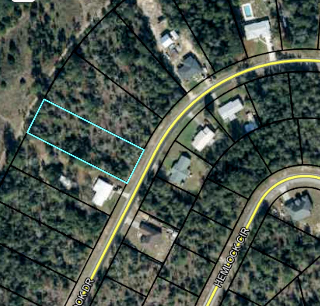 Unleash your dream home's potential in Sunny Hills. A fast growing community with lots of new construction. This property offers .85 of an acre of landjust a few streets away from the Golf course green and club house. Sunny hills community offers access to a golf course, clubhouse, boat lake's beach, and Gaplake's boating fun. Conveniently located, you'll have easy access to NW FL Beaches Int'lAirport, I-10, and Panama City Beach's stunning white-sand shores. Enjoy Wilder Skate Park, playgrounds, Boat Lake Swimming & Recreation Park, and a golfcourse right here. Explore fishing ponds, lakes, and springs nearby. Act fast to own this prime lot in Sunny Hills - your gateway to a vibrant lifestyle