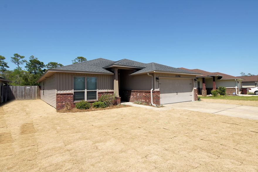 The Duncan Ridge neighborhood is steps from Navarre High School and features sidewalks, underground utilities (but no HOA)! This 3/2 home has a split floor plan with the guest rooms on the left when you enter and the master suite is at the back of the house. The kitchen is open the the living space and has granite countertops & stainless appliances. Laundry room is off the kitchen leading to the 2 car garage. Sliding door takes you out to the covered patio and fenced in backyard. Property line goes much further past the fence line.