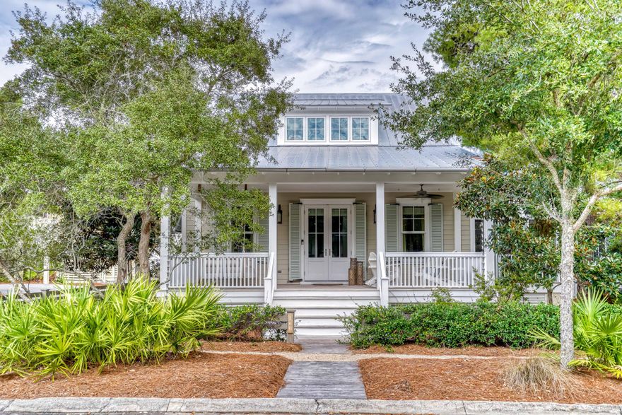 THE ONLY 5 BEDROOM HOME AVAILABLE IN WATERCOLOR! From the moment you walk in the door this TS Adams designed beach house offers the feeling that you have truly arrived at the beach. This quintessential Florida cottage offers everything needed for a truly relaxing retreat, enjoys a cozy feel without sacrificing space and its tucked away on a quiet corner just steps from the Frog pool and walking trails around Western Lake. Upon entering the home, you are welcomed into a bright and airy main living space complete with raised ceilings, shiplap accented walls, and an open concept. It also features a beautiful, updated kitchen and dining space and it comes complete with furnishings, luxury finishings, hardwood flooring throughout, and more. Lounge on the screened-in, outdoor terrace or spend time on the back patio in front of the outdoor fireplace. This cottage is full of amenities, including a two-car garage complete with a carriage house on the second level, ideal for guests to stay with their own kitchen and living space. Custom-built by Borges Brooks Builders with the highest construction standards and is loaded with extra features. Built in early 2011 and expanded in 2016 with every square inch of space utilized allowing walk in closets and ample extra storage. This home is virtually brand new having only been used by its owners. Situated only minutes from the Gulf, the community of WaterColor has amenities abound including; The Beach Club, The Lake House, The Boat House, Camp WaterColor, the Lake District Frog pool, tennis courts, various eateries, boutiques, bike trails and more. 

