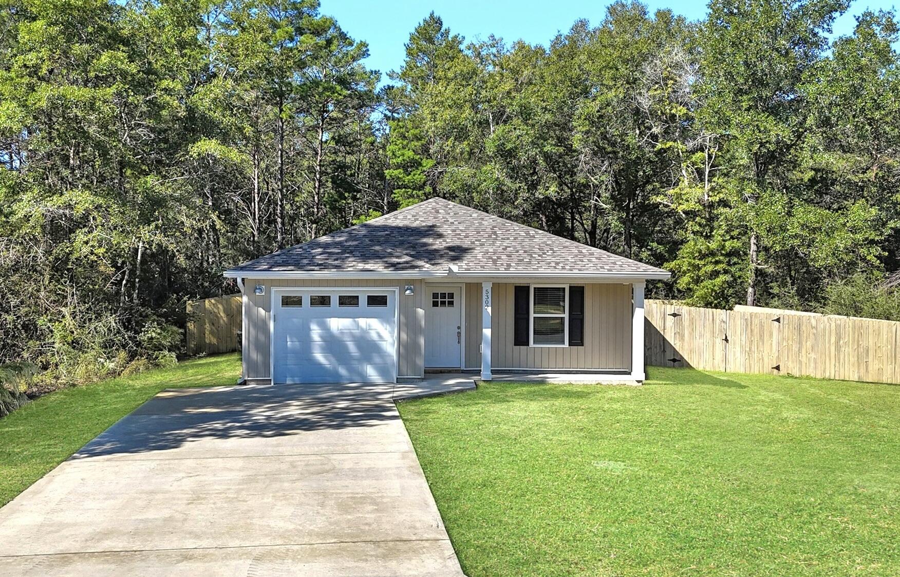 Step into Better than new living with this 2022 beauty! Why wait to build when this one checks every box, and then some! Featuring a bright, open concept island kitchen perfect for morning coffee or late night snacks! Beautiful vinyl flooring is both stylish and easy to clean (because life happens). The spacious master suite gives you plenty of room to unwind, and the huge backyard is ready to anything, pets, parties, or even parking your toys thanks to the large vehicle access gate and brand new fence all around.