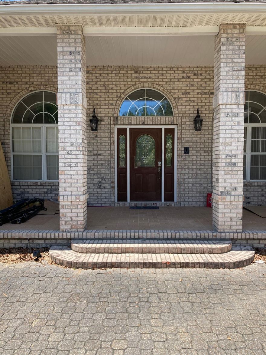 GORGEOUS home on huge lot in Rocky Bayou. This custom home features all the bells and whistles you come to expect in a home of this quality. From the moment you drive up you will experience the quality construction. Grand entrance features high end designer touches as does the rest of the home. Beautiful solid wood flooring in all main living areas. Corner accent gas fireplace is the focal point in the spacious living room. Enjoy the gourmet kitchen with granite surface counter tops beautiful custom cabinetry and large eat in area overlooking the backyard. Stainless appliances including dishwasher, stove, microwave and refrigerator (ice maker not warranted). Master suite is a dream. Master bath features a tranquil whirlpool tub and separate oversized glassed walk in shower. All bedrooms are carpeted and are large enough to accommodate bigger furniture. The laundry room offers a nice stacked washer/dryer (not warranted) & lots of extra storage cabinetry and counter space. Oversized yard and three car garage polishes off this fine home. Owners  will consider pets with restrictions. Any pet must be spayed/neutered, housebroken (no puppies) and current on all shots. There will be a non refundable pet fee required. NO smoking. Any person 18 years old or older must apply separately. Tenants required to carry renter's insurance.