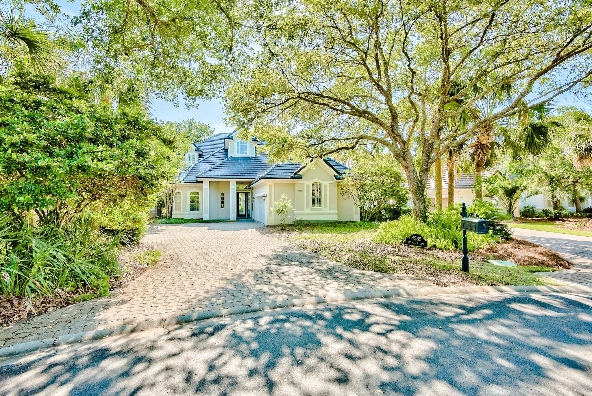 PROFFESIONAL PHOTOGRAPHY COMING* Inside the gates of the celebrated Regatta Bay neighborhood lies this newly updated home with beautiful views overlooking the 4th fairway. A large foyer with soaring ceilings welcomes you inside of this 3 bedroom home which offers a first level master bedroom, a private office which could easily be converted into a 4th bedroom, 2 living spaces, an additional bonus/loft space along with an oversized hobby/storage room upstairs. The home has just been updated with a new roof, a beautifully re-designed kitchen with quartz countertops and new flooring throughout the entire first level. The oversized lot allows for a generously sized cobblestone driveway and around the rear of the home there is plenty of space to add outdoor entertainment or potentially a pool.