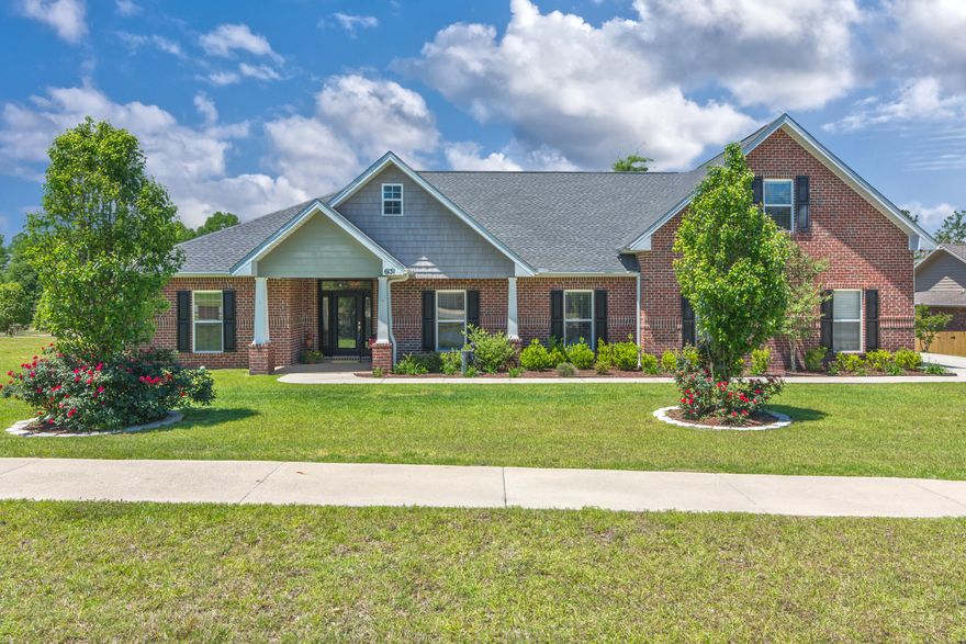 Your beautiful estate sits on a corner, half-acre lot. 3427 sq feet of space to enjoy plus a 2.5 car garage. 4 bedrooms, 3 full baths downstairs and one LARGE bonus space, bedroom and full bath upstairs. Almost every room has a trey ceiling and extensive trim and crown detail throughout. The master wing features a double trey ceiling, oversized bedroom, access to the back patio. Master bathroom has storage galore! Large tiled shower, soaking whirlpool tub and a master closet that you can't run out space in. The living, dining and kitchen are open and ready to host a dinner party! The kitchen has two toned cabinetry, kitchen island and stainless appliances. Remaining first floor bedrooms are split each having a full bath near. Enjoy coffee on your covered porch with plenty of room for play.