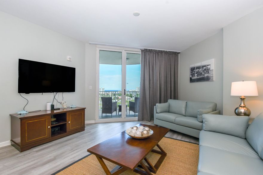 9th floor unit is turnkey and being sold fully furnished! NEW furniture with a pull out couch, table, wooden floors, and freshly painted. This gorgeous unit overlooks the plush palm trees and the beautiful Emerald Coast! The kitchen features painted maple kitchen cabinets, subway tile backsplash, and granite countertops. Master bedroom offers a king size bed with access to the balcony. Bonus bedroom has custom full bunk beds with adjoining bathroom and walk in tile shower. This junior two-bedroom condo offers an open concept living and dining area, as well as an inviting 9th floor balcony that overlooks the exquisite pool area and has views of the Gulf of Mexico. The Palms of Destin have wonderful outdoor luxuries to enjoy with friends and family! Amenities include an expansive 11,000 SF lagoon pool with waterfall and spa, children's pool, playground and splash pool, tennis and basketball courts, first class fitness center, seasonal shuttle service to the beach, and covered protected parking. Also on site, is the conference center, office center, and reception desk. The association fees include, water, electricity, internet, trash and insurance on the building. Easily get to the beach without worrying about parking via the shuttle which takes you to Henderson State Park or the public beach access. The location is convenient to shopping, local attractions, and many of the restaurants Destin has to offer. Excellent opportunity for a vacation rental, second or primary home. Financing for The Palms of Destin must be via a Portfolio Loan. Room dimensions and square footage are approximate and should be verified by buyer.
