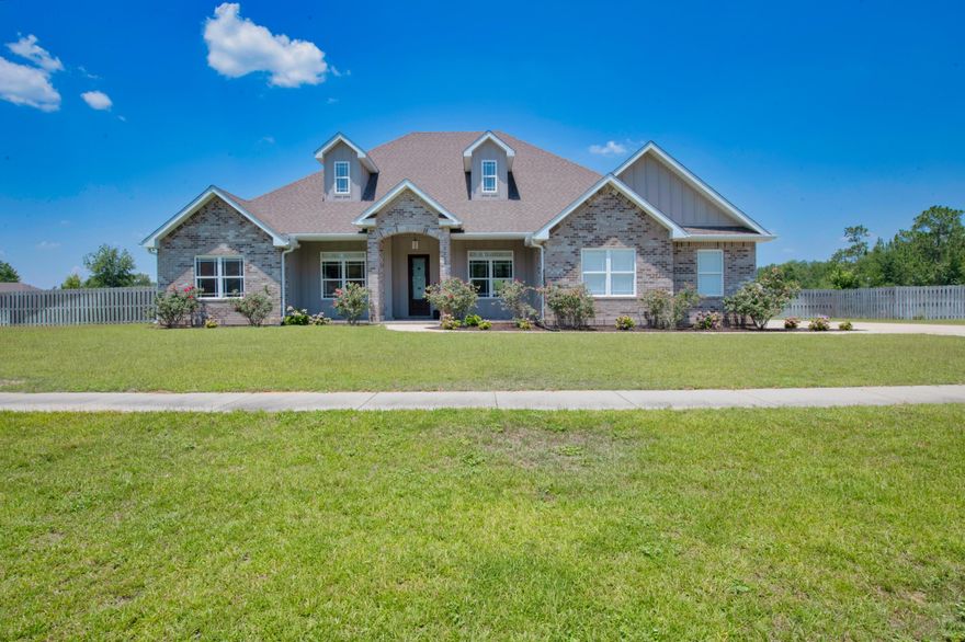 Would you like to own a POOL home on nearly ¾ of an acre in a gated community? Now's your chance! This stunning home features 9-ft ceilings, wood-like tile throughout the downstairs-except in bedrooms, crown molding in main living areas, custom organization in all closets, granite throughout (except the laundry room), an abundance of storage space, the home is wired for a security system, with cameras around the home including the oversized shed (which has power!). All the main living areas are on the first floor, including a REAL mother-in-law suite. Bonus/flex rooms are upstairs. Mother-in-law suite has its own bedroom, bathroom with shower/tub combo, closet, & linen closet all with separation from the rest of the home. . The kitchen, with it's eat-in breakfast nook, HUGE island, and dining room are perfect for entertaining. The kitchen features expansive granite counter tops, tiled backsplash, decorative hood, double ovens, & a pass through to the dining room that would serve as the perfect buffet for large gatherings. The kitchen is open to the living room.  Living room features built-in surround sound speakers ideal for movie nights. Off the kitchen is the mudroom w/ built-in cubbies, bench, & custom organization; the laundry room; & master suite. The master suite has a trey ceiling in the bedroom; a vast bathroom with 2 showers in the tiled/glass surround behind the garden tub, linen closet, and dual sink vanity; and enormous walk-in closet with motion sensor light. The master bath has its own private entry into the laundry room. The other 3 bedrooms and MIL suite are on the opposite side of the home off the living room giving the master suite additional privacy. Head up stairs to the bonus/flex room areas. This is space is great for playrooms, offices, or can be used as additional bedrooms. The carpeting upstairs has upgraded padding for increased comfort & noise reduction. Enjoy your summer days in the heated, saltwater, gunite pool!  Complete with tanning shelf and built-in umbrella holder. Control the lights and waterfall all from your smartphone. There are 2 entryways to the backyard one of which has easy access to the half bath. Don't miss your opportunity to view this spectacular home that is minutes away from shopping, restaurants, and the soon to be Crestview Commons.