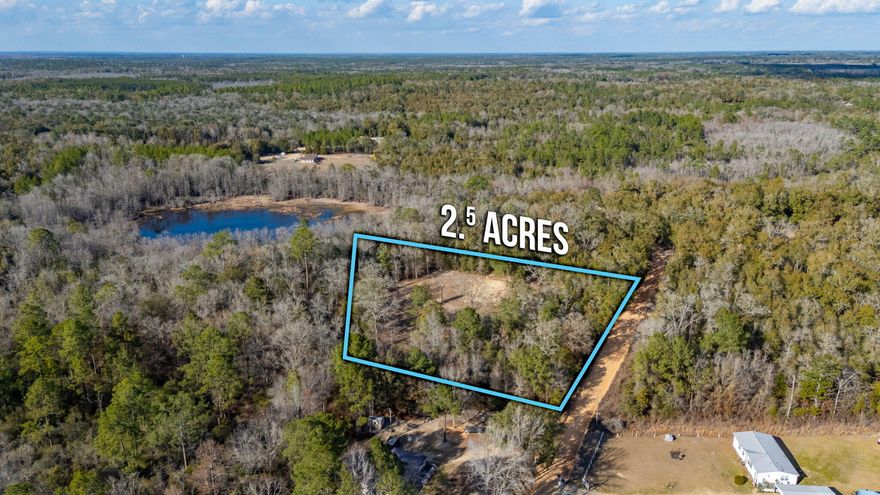 Do you know how many times I hear ''I want land that already has water, power & septic'' ..? More times than I can count! Here is your chance. This property is a gorgeous 2.5 acres tucked back in the country on a county-maintained road. It has some mature hardwoods left with a tree line at the front for added privacy & a portion of the property cleared. When you drive up, you are welcomed by a nice, milled asphalt driveway and a gate, blocking off any unwanted guests. Before the owners plans changed, a house pad was put in & is still present. The groundwork is out of the way & ready for you to bring your home plans! Contact me or your favorite realtor today to set up a tour of this property. School District: Vernon Elementary, Middle & High School.