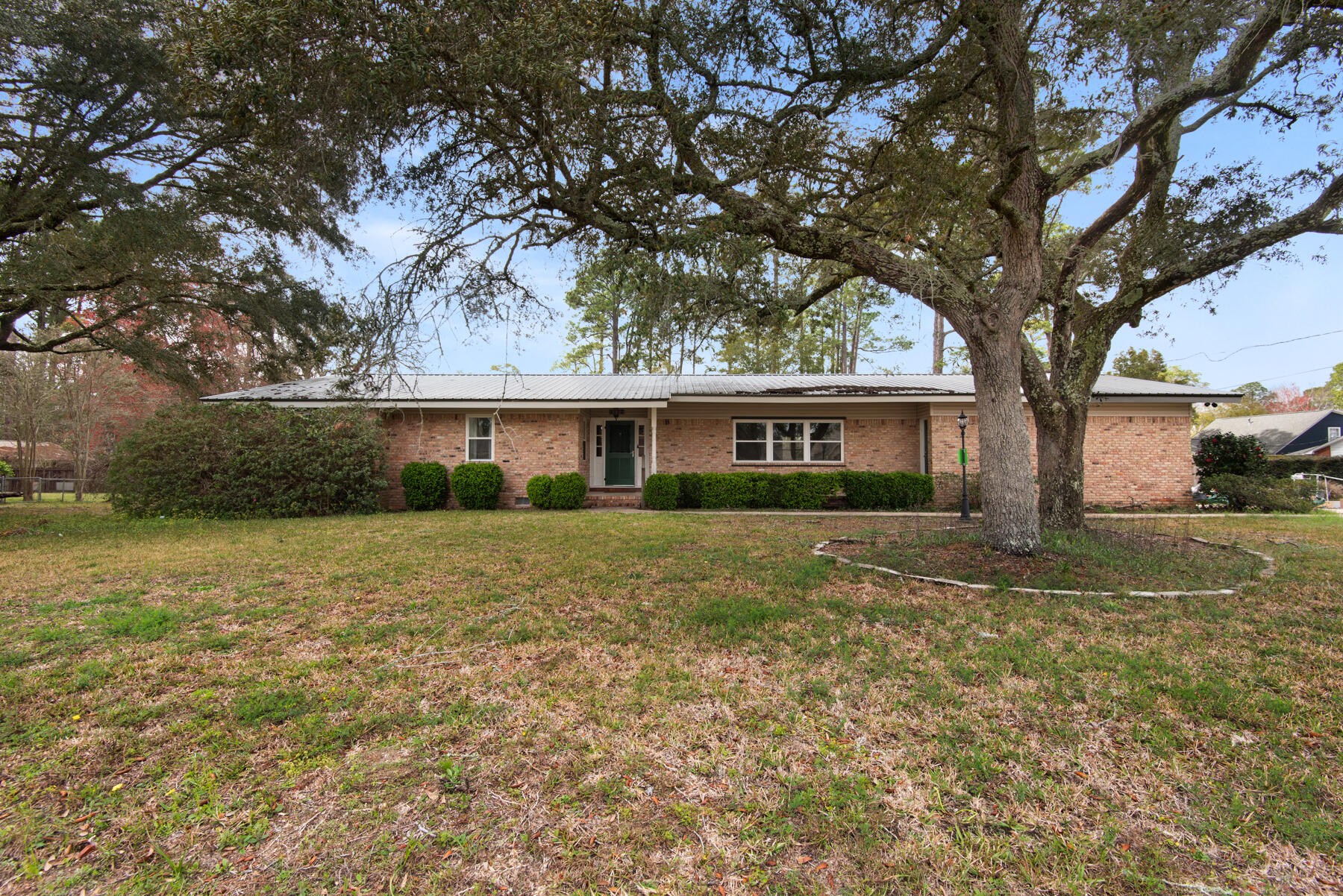 Nicely updated property on over half-acre, flat corner lot in a great Niceville location! This 4 bedroom/2 bath home is move-in ready and waiting for your family to make it your own! Boasting two large living spaces, an updated kitchen with tons of storage and great appliances, nice-sized bedrooms, updated bathrooms, 2017 HVAC with updated ductwork and insulation, 2020 gas water heater and 2010 metal roof, large fully-fenced backyard with a 20x16 workshop! Come see for yourself how perfectly this one will check everything on your wish list!