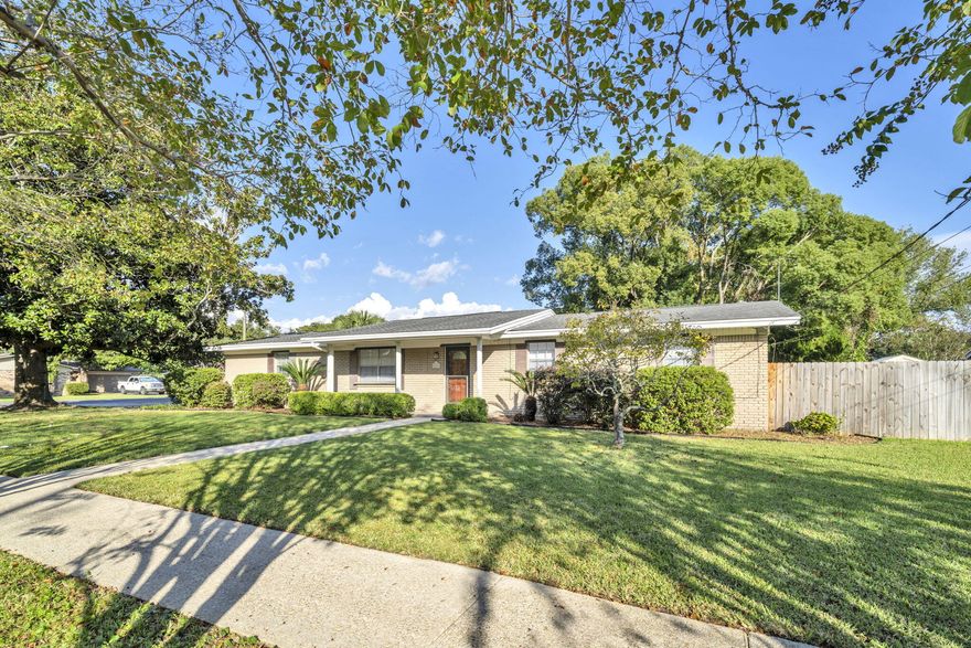 This charming 3 bedroom home has been outfitted with a brand new hot water heater, new carpet in all bedrooms, freshly painted throughout the home- including kitchen cabinets, new microwave, 2 new ceiling fans and a face lift on the landscaping. Enjoy a large corner lot- with a great climbing tree which adds lawn shade, extra space for parking outside the garage with 2 spaces, and lots of space for lawn activities & decorations! (Enjoy the neighborhood transformation during the holidays to Candy Cane Lane, candy canes included!) There's a small open deck off the back of the home to enjoy as well.In addition to the great outdoor space, the cozy interior invites you into a place for gatherings; to share the day and relax in your own home. Come by for a tour today!