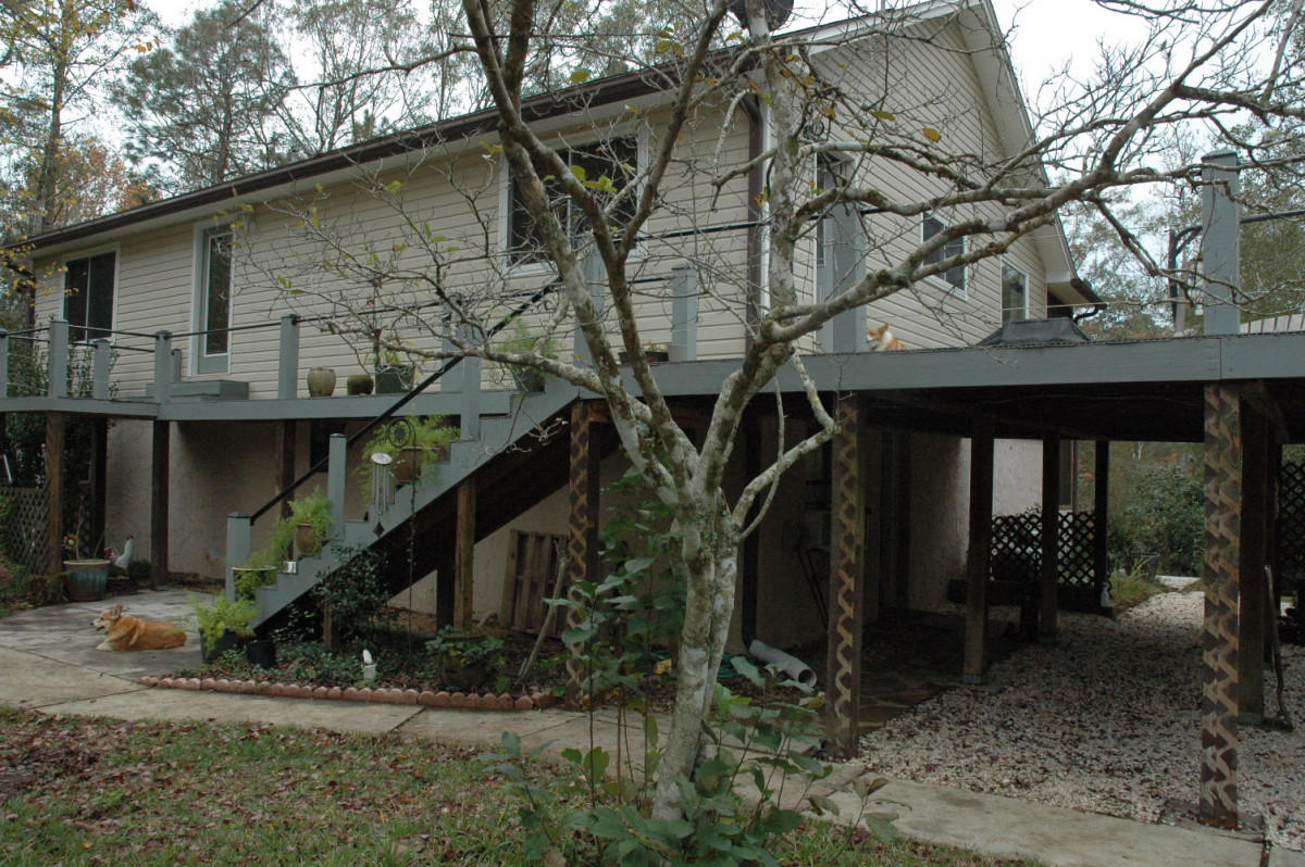Looking for some privacy and acreage away from noisy neighbors, yet still within 6 miles from town, grocery stores, restaurants and schools? Then this creek front unique property is the perfect location for you! Located on just under two acres, this country setting offers an outdoor paradise for kids and adults alike. Private, white sand, clear creek for cooling off in the hot summer months. Outdoor features - fire pits, secure fenced area for pets, 4 covered carport spaces double gates for boat/RV parking, fruit trees, treed areas for target practice, archery, wildlife watching, zoned for horses, the list goes on and on.