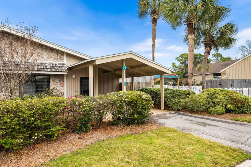 Let's all say this together...what are the 3 most important aspects to consider when buying real estate?  ''Location, Location, Location''!  Look no further, because not only is this 2 bedroom, 1 story unit located within the POPULAR Seascape Resort, but it's also nestled in between the largest heated swimming pool (5 to choose from) and the tennis courts. Take a short walk and you will be at that famous white sand, emerald water beach or the pickleball courts! Or take a short drive and  park directly across the street from the beach in a dedicated beach parking lot. This would make you a great short term rental or a great place to live, but let me warn you...you will have guests, because your friends and family will love it. Enjoy outside living with the privacy fenced side yard. Come se