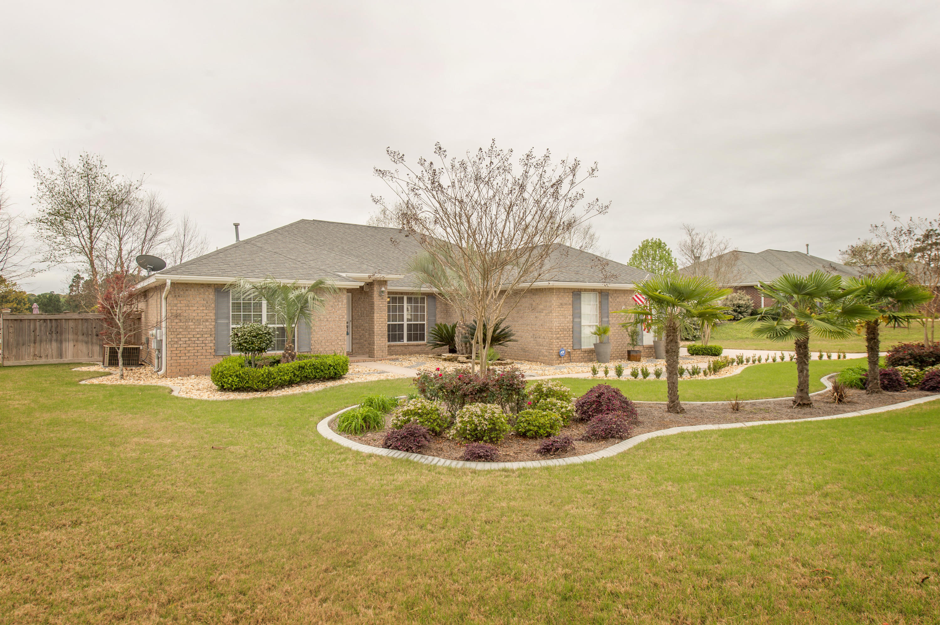 GORGEOUS 4 bedroom/3 bathroom home in desirable pool community Silver Oaks! This property, inside and out, has been maintained immaculately and is move-in ready. Exterior features an extra large fenced backyard with double 10' gates and driveway that extends along the side of the house, behind the gate, PERFECT for storing your boat or RV (RV outlet installed!). Both the front yard and backyard are beautifully landscaped- porch/deck is large and covered (freshly stained!) and boasts an incredible water feature (see photos!). The interior of the home features all laminate and tile flooring and 6 inch baseboards. Kitchen has cabinets galore and ample counter space (smooth surface counters), that extend into the breakfast nook. Stainless steel appliances purchased in 2015.