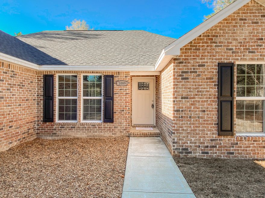 This new construction home is one of a kind with over 1.3 acres of land and located less than 5 minutes from the Interstate! The builder has left some beautiful trees in the front yard to give the new owners a sense of privacy. This is a 3 bedroom, 2 bathroom home and will feature vinyl plank flooring throughout the living areas and carpet in the bedrooms. The master bedroom will have trey ceilings while one of the guest bedrooms will have a vaulted ceiling. The gas fireplace in the great room will make a great focal point for the room. The kitchen will feature a breakfast bar and granite countertops. There is a two car garage with a storage room allowing for the perfect workshop! There will be brick on all four sides of the home.