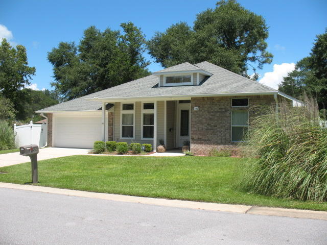 PRICE REDUCED! Gorgeous home nestled on quiet street in Valparaiso, just minutes from Eglin AFB. This custom built beauty provides many upgrades including 10ft ceilings, recessed lighting, open floor plan and security system. Double beveled glass door entry, formal dining room, split floor plan and a Jack & Jill bath with a walk in tub. 3 out of the 4 bedrooms have walk in closets. Kitchen is open to the living area and sports stainless Kenmore appliances, and a breakfast bar. Master bedroom has a private glass door entry to the large screened in patio overlooking a plush back yard. Master bath features his/hers separate vanities, and a large stand up shower with a bench. Other features include video doorbell, security system, white vinyl fence, and shed in backyard conveys. This home has been very well maintained and will not last long. Call today to schedule your viewing!