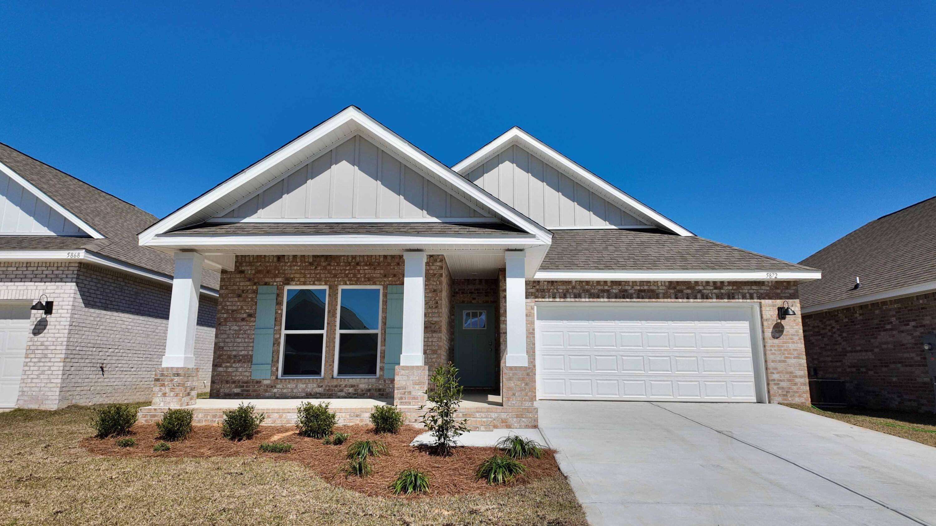 ALMOST COMPLETE AND MOVE IN READY!! GORGEOUS NEW construction in Marlin Place with a community pool, pavilion, sanded volleyball court, cornhole area and streetlights for residents to enjoy. The stunning Riverside floor plan boasts 5 bedrooms and 3 bathrooms with a 2-car garage. Outstanding & spacious floorplan. Stunning Quartz countertops in kitchen and baths, all stainless-steel appliances, gorgeous EVP wood look flooring & plush carpet in the bedrooms. So many great amenities and this highly desirable home comes standard with a Smart Home Technology package with several Smart devices for your convenience. Home also includes hurricane fabric window & door protection and a beautiful classic curb appeal. Great floorplan and a convenient, fast growing Milton location.