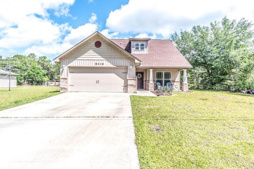 Welcome to your Cozy Craftsman Home. Light, Bright and MOVE IN READY. Located 4 miles from Navarre Beach is this 2014 2 story build featuring an extra large split floor plan, perfect for entertaining. 4 Bedroom 2 1/2 Bath PLUS an office off the front foyer! Downstairs level Master Bedroom with Master Bath en'suite featuring his and hers closets and garden tub. Three extra bedrooms and additional bathroom upstairs so your guests can stay with privacy and comfort. Wine and Dine your guests in the spacious kitchen and dining area. Granite counter tops throughout. Luxury vinyl plank throughout living areas, Tiled wet areas, and carpeted bedrooms. Spend the beautiful Florida days outside on your large .46 of an acre yard, plenty of room for a pool!