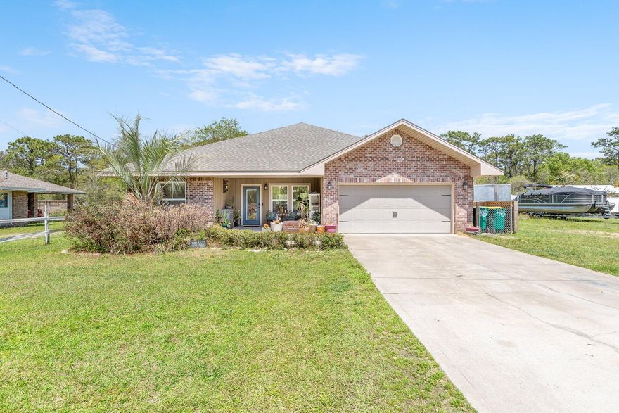 ACCEPTING Back up offers.  Now is YOUR chance to enjoy the country setting of this contemporary home right in the heart of Fort Walton Beach! Your new home is just a quick commute to Hurlburt or Eglin AFB, and minutes from the beautiful beaches of the Emerald Coast. This split floor plan, Tracy Acree built, home has three generous sized bedrooms sharing a full bathroom on the left side of the home. The spacious modern kitchen has stainless steel Frigidaire appliances, granite counter tops, a center island, and the Frigidaire Professional extra large refrigerator/freezer is sure to delight any chef! The extensive breakfast bar has a lovely brick accent wall underneath, and over looks the living room and out to the back yard