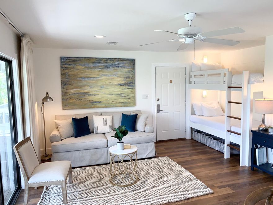 Dive into the carefree 30A lifestyle from this beautifully renovated 1BR/1BA + Bunks condo in Beachwood Villas, perfectly positioned in the heart of Seagrove Beach along Scenic Highway 30A. This second-floor retreat has been thoughtfully designed to maximize space, creating an open and inviting atmosphere. The open concept living and dining areas flow seamlessly, while the private bedroom suite and built-in bunks offer both comfort and functionality. Step onto your balcony to enjoy serene views of the community's lush green spaces--the perfect spot for morning coffee or evening relaxation. This condo is fully upgraded with luxurious touches, including sleek wood flooring, quartz countertops, stainless steel appliances, a chic subway tile backsplash, modern lighting, and a glass shower door. Beachwood Villas offers resort-style amenities, from two sparkling swimming pools and tennis courts to a playground, all just moments away from public beach access. Stroll or bike to the nearby shops, restaurants, and attractions of Seaside and WaterColor, making this an ideal investment or personal retreat amidst the best of 30A.