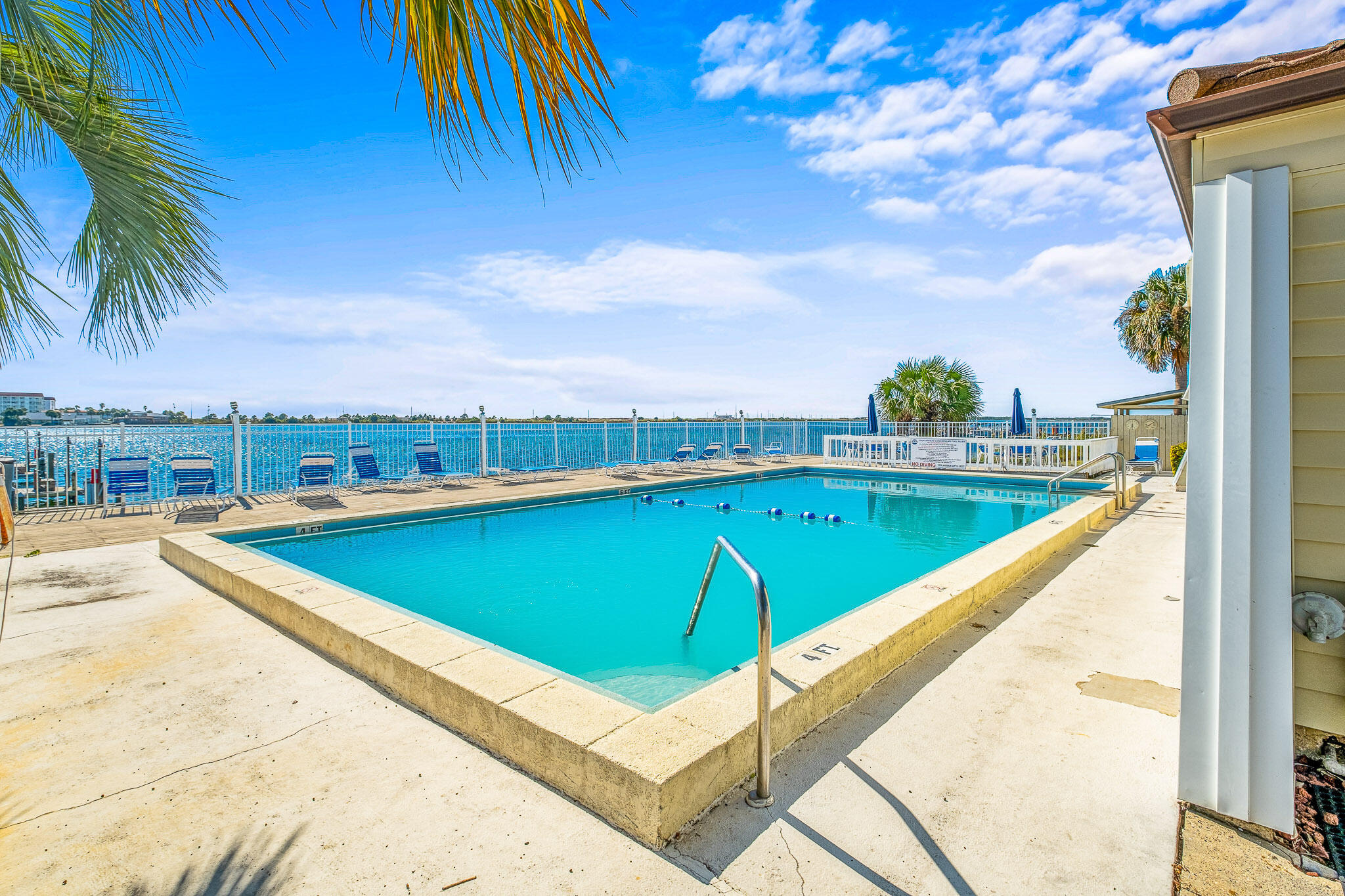Lowest price 2 bedroom unit for sale in the complex AND the seller will offer $2000.00 closing assistance. This desirable layout in Fountainhead Condos, a ground-floor unit featuring two bedrooms and one bath. Enjoy summer to the fullest with Fountainhead's excellent amenities, including a swimming pool, fishing and boating docks, a fantastic community room, and tennis courts. Whether you are looking for an amazing long term rental unit as an investor or to live in the unit and enjoy a boat slip rented through the HOA, Fountainhead Condo checks the boxes. Sellers just had the unit repainted and added wall to wall tile along with a new dishwasher.These units do not stay on the market for very long, call your agent today.This complex does not allow short term rentals, 30 day min