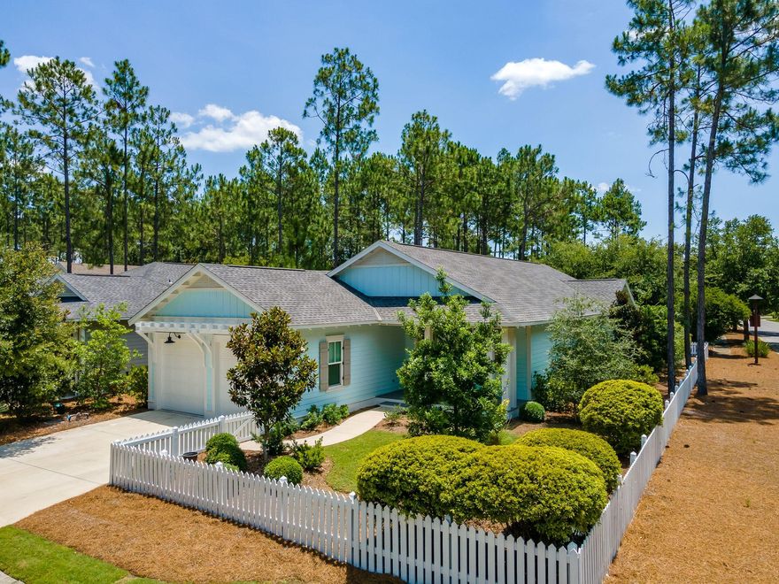 Least expensive Phase 1 home in Watersound Origins! This 3 bedroom, 3 bath ranch home has a great open floor plan perfect for entertaining with the living/dining and kitchen areas all flowing out to the spacious screened in porch. This home offers a quiet setting with unparalleled privacy on a corner lot overlooking the fenced backyard that leads out to a community park and nature trail. The kitchen features granite countertops, gas range, large pantry and built in bar/desk area. With large closets, 2 car garage, soothing color scheme and tons of natural light, this home makes a great full time or part time residence. Origins is a short term rental restricted master planned community complete with a golf course, resort style pool, tennis and pickleball courts and a fitness center.