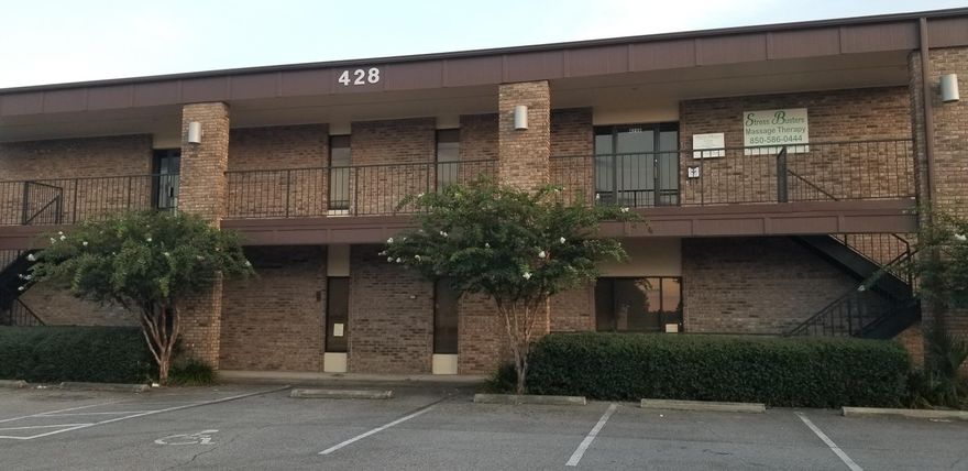 2nd floor office with large open area as you enter, 2 private offices, 2 restrooms.   Front and rear entrance with front and rear parking.  Across the street from Publix and Aldi's.