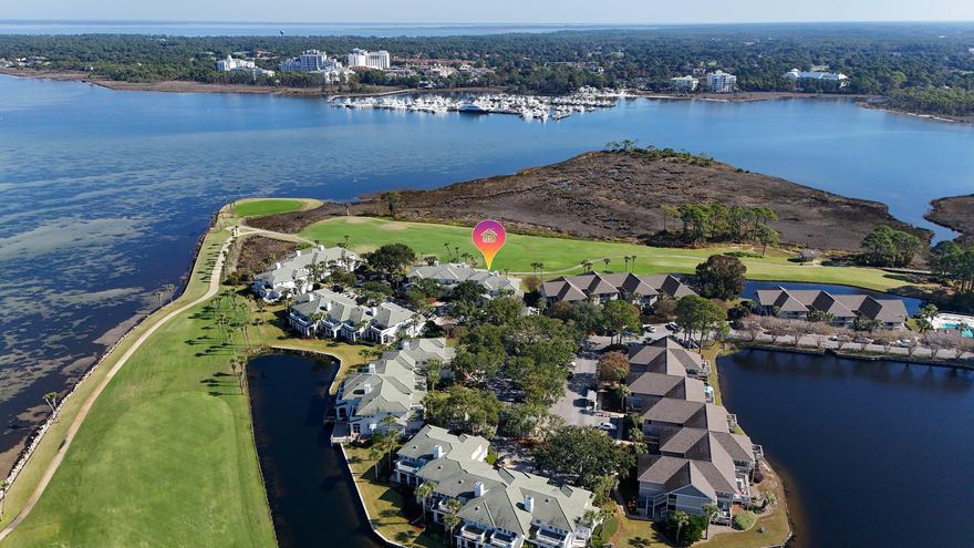 Welcome to 842 E Grand Harbour in the Sandestin Beach/Tennis Resort, Miramar Beach. With STUNNING 180 water views of the Choctawhatchee Bay, Horseshoe Bayou and Baytowne Wharf's Marina. This 3/3 2225 sf townhome is situated on the 14th green of the Links Golf Course which overlooks the BAY. The Dining Room, Living room, SunPorch and Main Bedroom ALL have views of the water-grab your paddle board and  swim with the dolphins- right outside your door!!!  Or watch the gorgeous private yachts/boats cruise through the Bay en route to the Marina. Enjoy morning coffee or nighttime glass of wine while the admiring your own personal water views. A truly relaxing place to call home. Gourmet Kitchen remodeled w Stainless steel appliances so cooking for yourself/guests a pleasure after a day at the beach. This home is meticulously maintained by the owner. This community also has its Owen keyed-entry pool w some of the LOWEST HOA's in Sandestin. Move-in ready as all furniture conveys. Amenities in Sandestin include: 24 hour security, golfing, tennis, pickelball, exercise facility w spa, walking trails, shopping dining, and the SUGAR WHITE SAND of the BEACH!!!
YOUR DREAM home awaits!!! 
MAKE THIS HOME YOURS and ENJOY RESORT LIVING 
at its FINEST!!!!
***Washer/dryer convey
***All furniture included in sale of home 
**New Roof 2019
**New AC 2019, 2020
**New Kitchen appliances and Water Heater 2021
**Building painted/waterproofed 2023