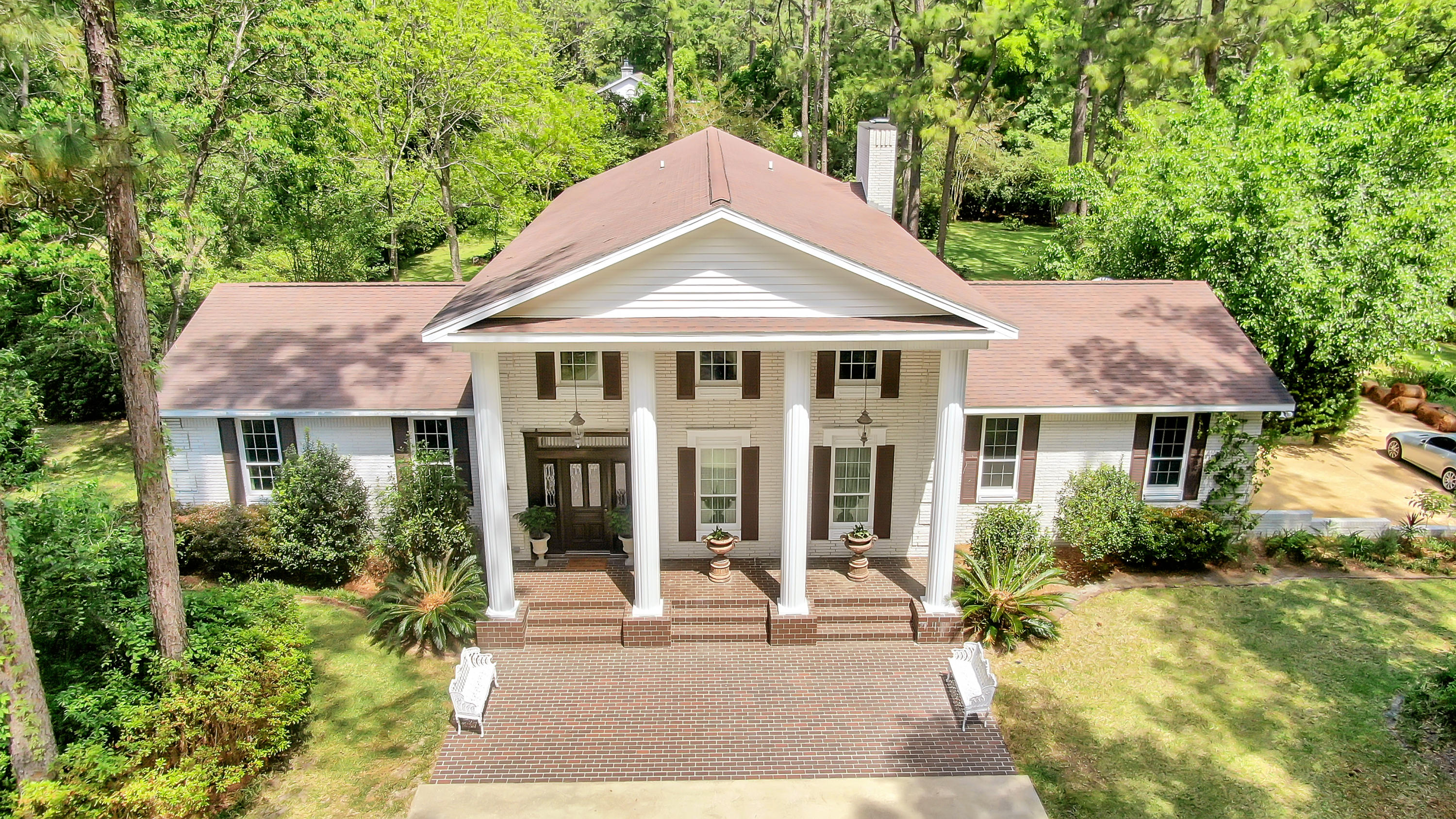 Genuine character is expressed throughout every inch of this 3382 S.F. two story classic southern home set in the middle of 2.4 manicured acres. 4 bedrooms, three baths, family room, living room, formal dining & breakfast nook all have been designed and built with quality and craftsmanship that cannot be found today. Flooring includes Italian marble, imported South American hardwoods & heart pine. Gas fireplace in the family room & the master suite. This home is great for entertaining. The picture book landscaping includes azaleas, hydrangeas, day lilies, camellias and roses. The complete 2.4 acre parcel can be watered by the eleven zoned irrigation system that is supplied by its own private 4 inch deep well. New roof in January of 2012. shown By appt. 24 hours notice.