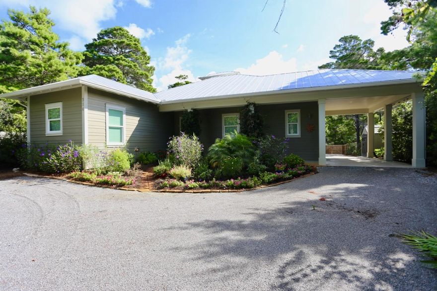 Priced to Sell! Do not miss this charming house built for privacy and comfort. The house sets over a 100 feet off the road on a double size lot in the Beach Highlands 1st Add s/d. The open living and dining area with built in book shelves and cupola/skylight opens to a large screened porch. Perfect for entertaining. The chef's kitchen has built in spice shelves, a 36 inch gas stove and oven and a built in electric wall oven and microwave. The kitchen also has Cambria quartz countertops, large island with prep sink, a beverage refrigerator and pantry. The large master bedroom has a walk-in closet and large walk-in shower. In addition to the three bedrooms there is a separate office with built-ins and laundry room with stackable washer/gas dryer.